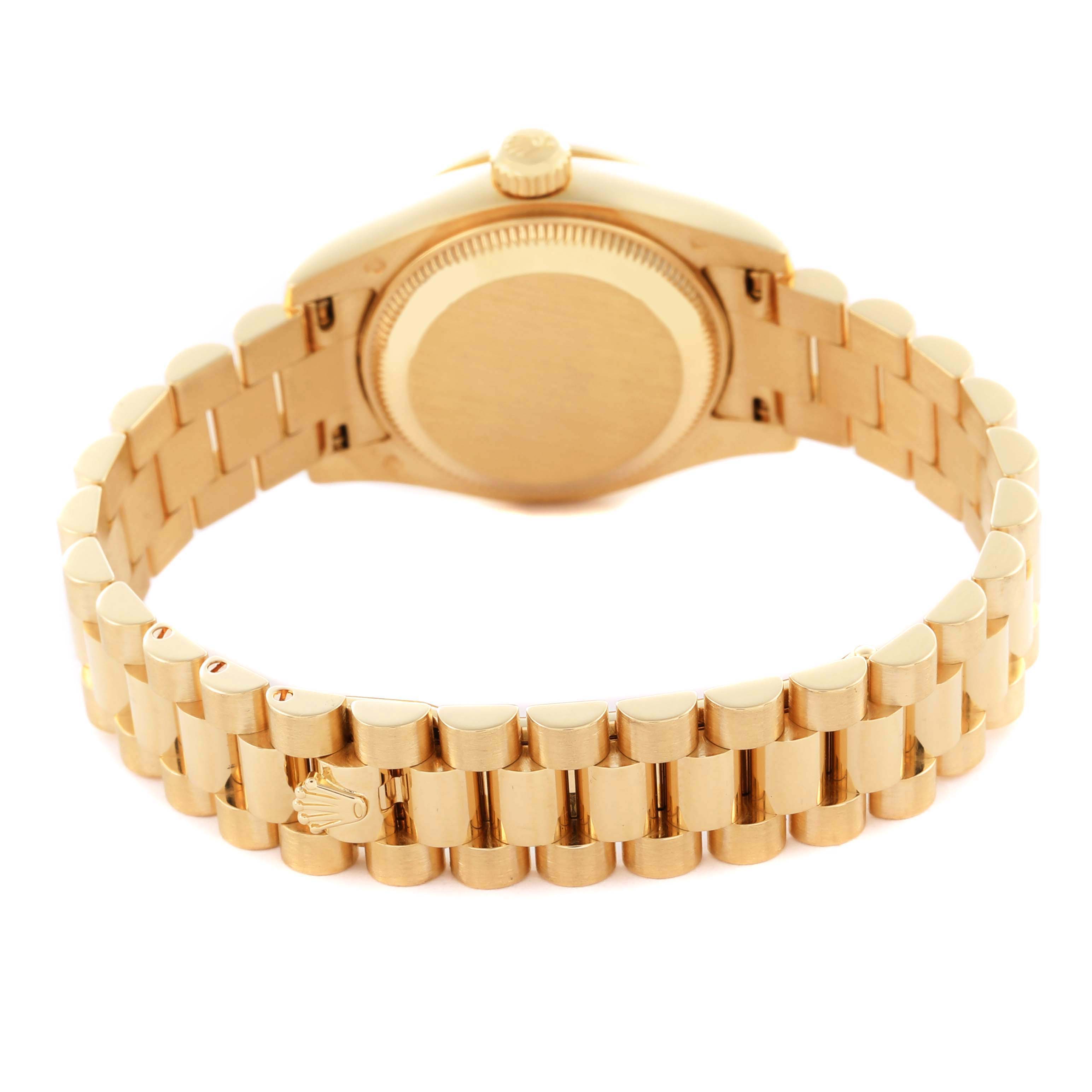 The Rolex President 179138 Women's Yellow Gold Champagne Dial 179138 Women's Yellow Gold Champagne Dial model is shown from the back, highlighting the bracelet and case back.