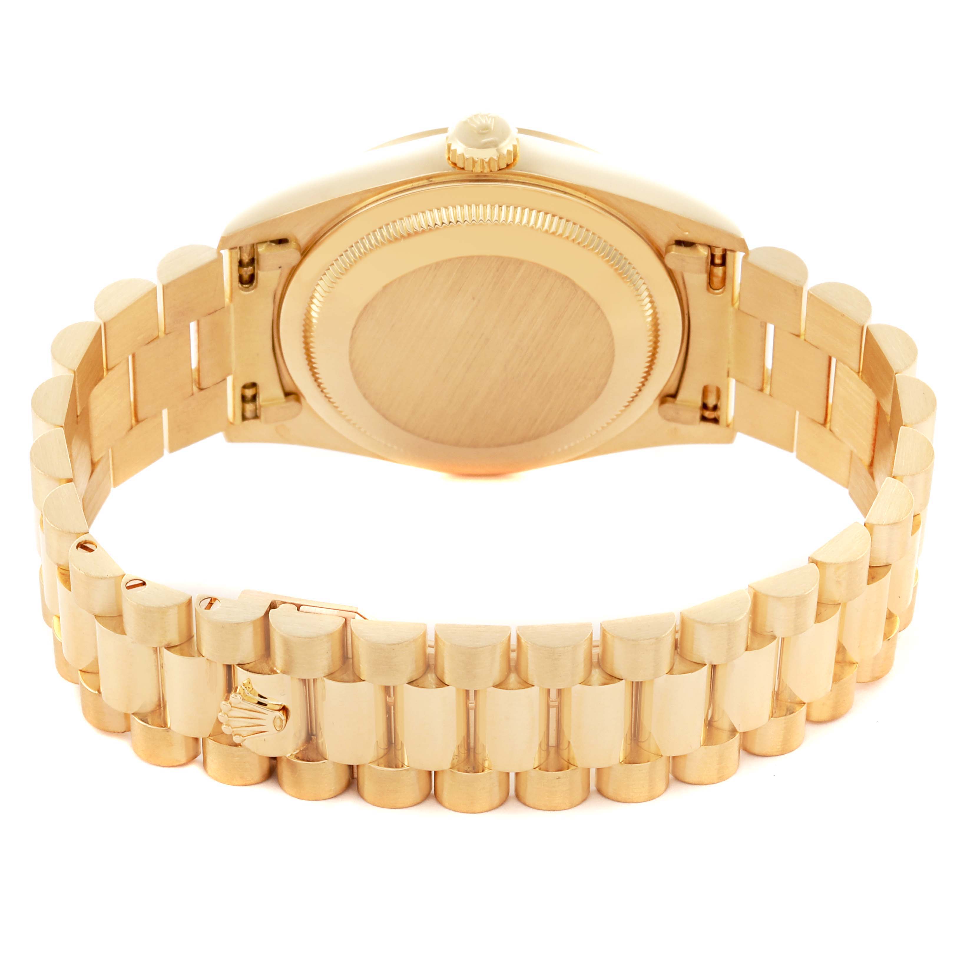 The Rolex President 18238MR Men
s Yellow Gold Champagne Dial 18238MR Men
s Yellow Gold Champagne Dial model is shown from the back, highlighting the case back and bracelet clasp.