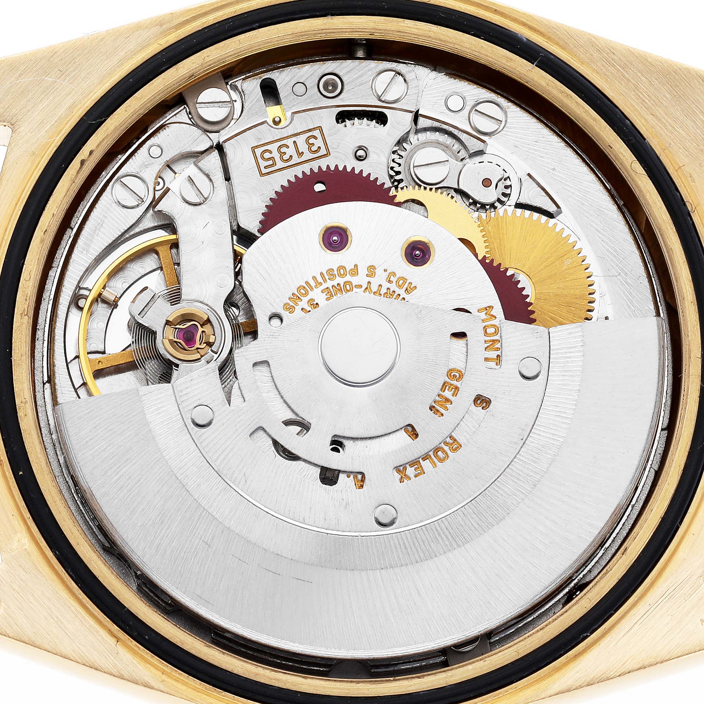 The image shows a close-up of the Rolex President 18238MR Men
s Yellow Gold Champagne Dial 18238MR Men
s Yellow Gold Champagne Dial model
s movement mechanism from the back.