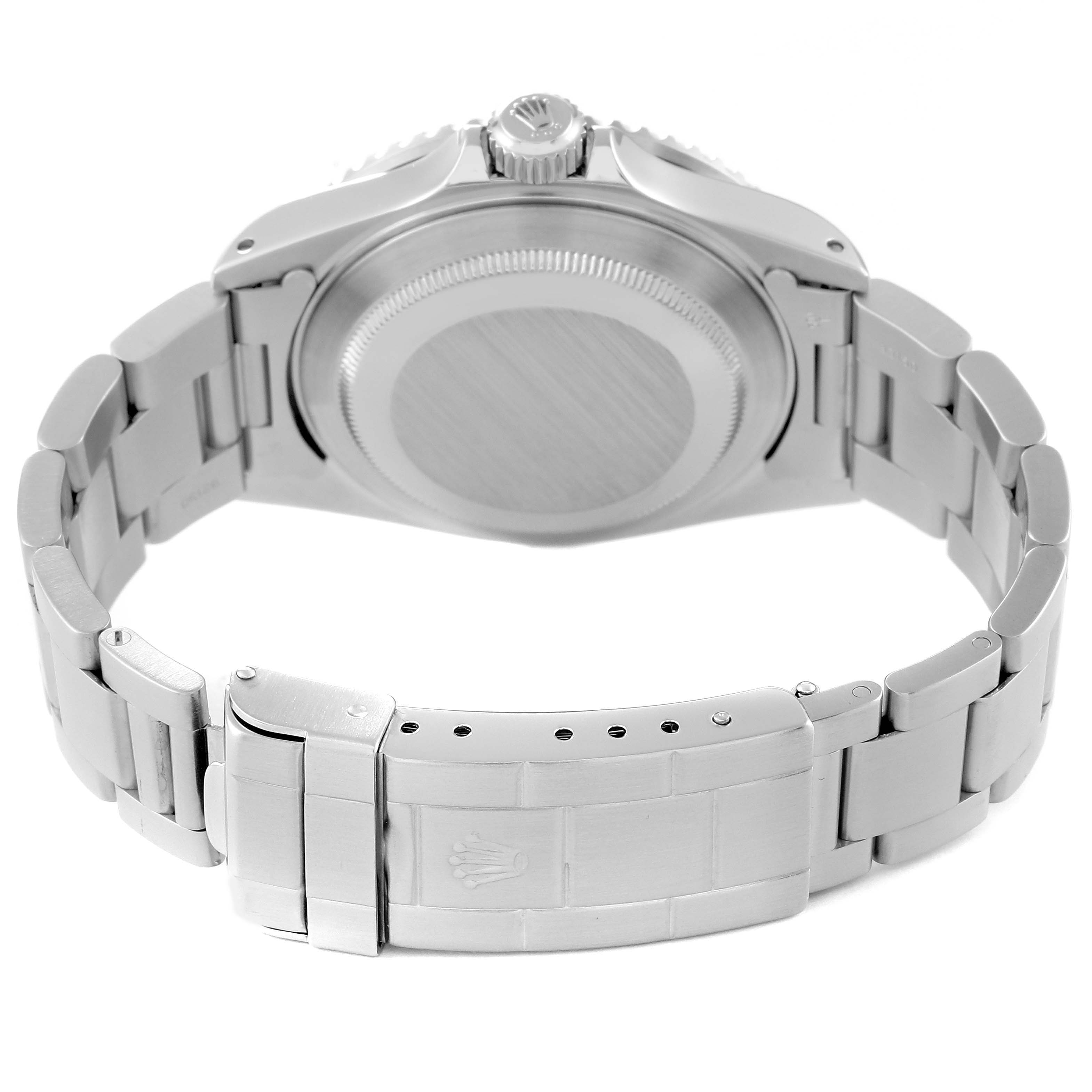 The image shows the back view of a Rolex Submariner 16610 Men
s Stainless Steel Black Dial 16610 Men
s Stainless Steel Black Dial watch, focusing on its case back and metal bracelet clasp.