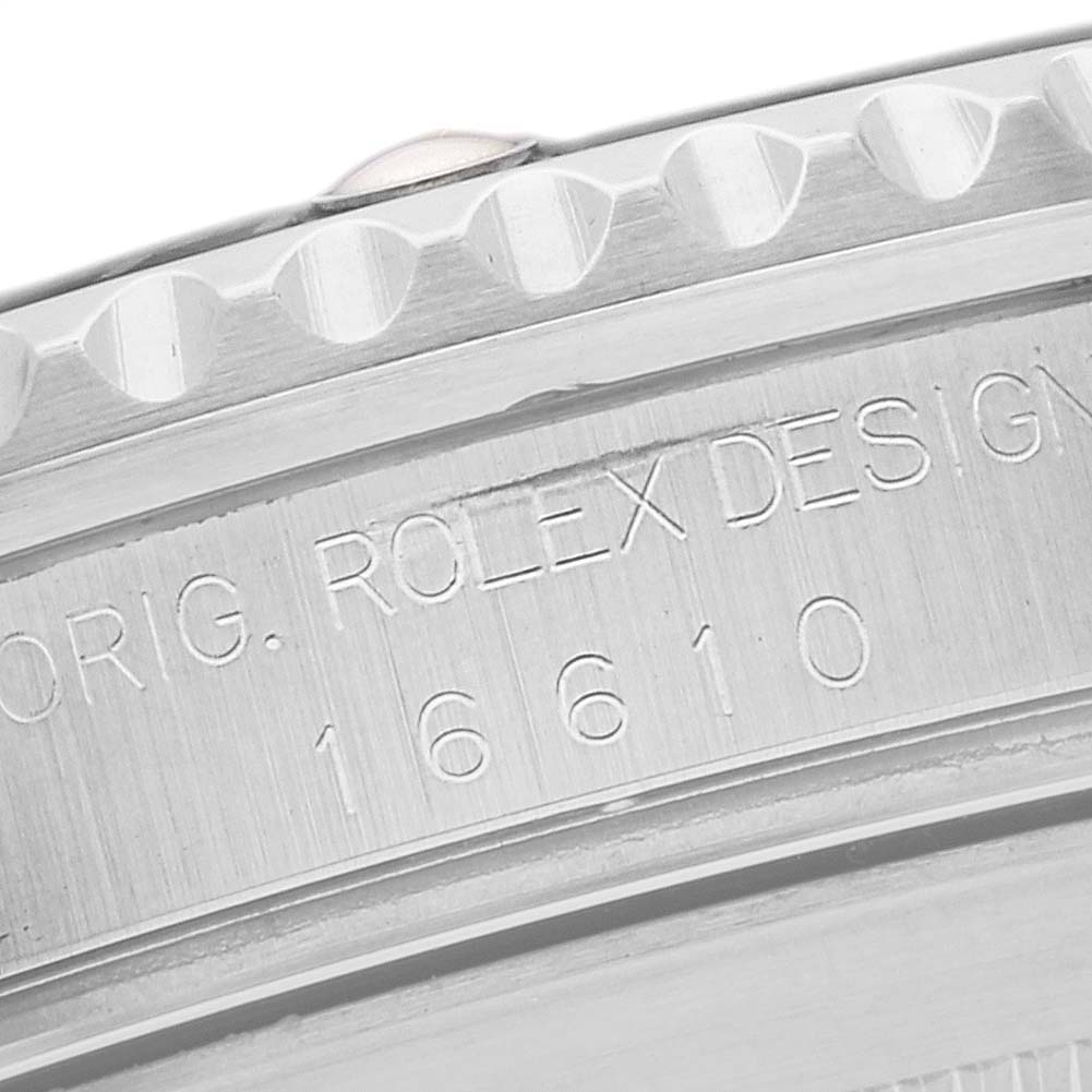 This image shows a close-up angle of the bezel and engraved reference number of a Rolex Submariner 16610 Men
s Stainless Steel Black Dial 16610 Men
s Stainless Steel Black Dial model.