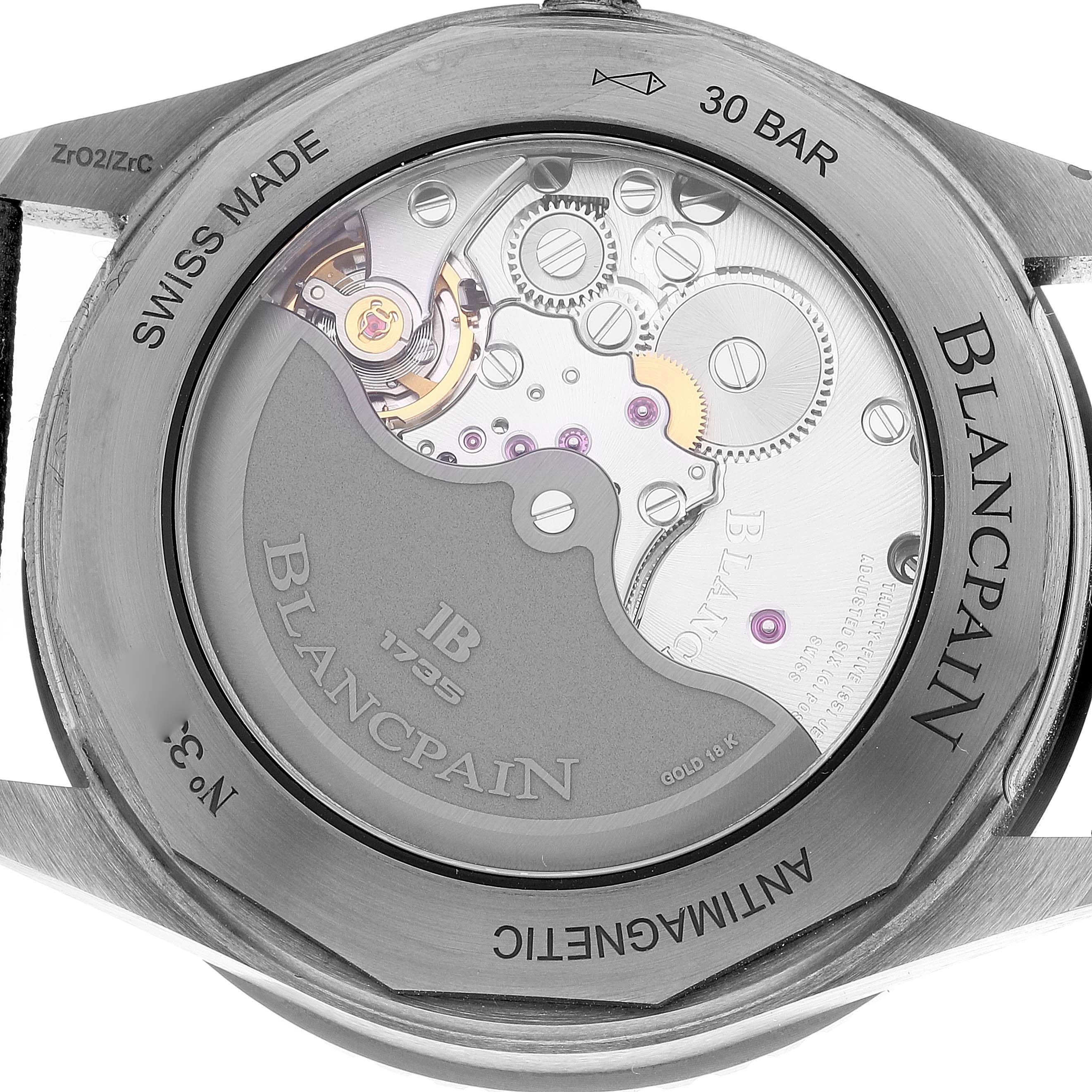 The image shows the back of a Blancpain Fifty Fathoms 5000-0240-052A Men's Ceramic Blue Dial 5000-0240-052A Men's Ceramic Blue Dial watch, displaying its intricate movement and engravings.