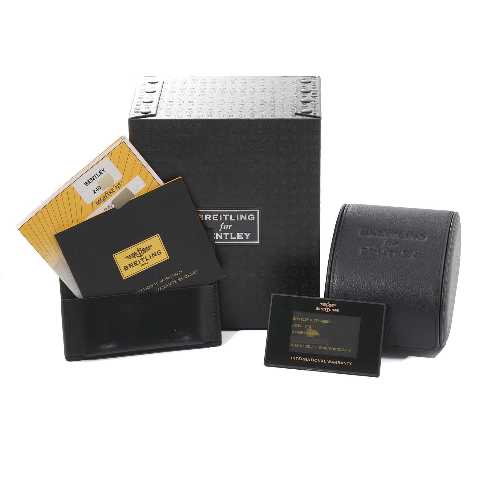 The image shows the packaging, warranty cards, and a watch case for a Bentley model by Breitling.