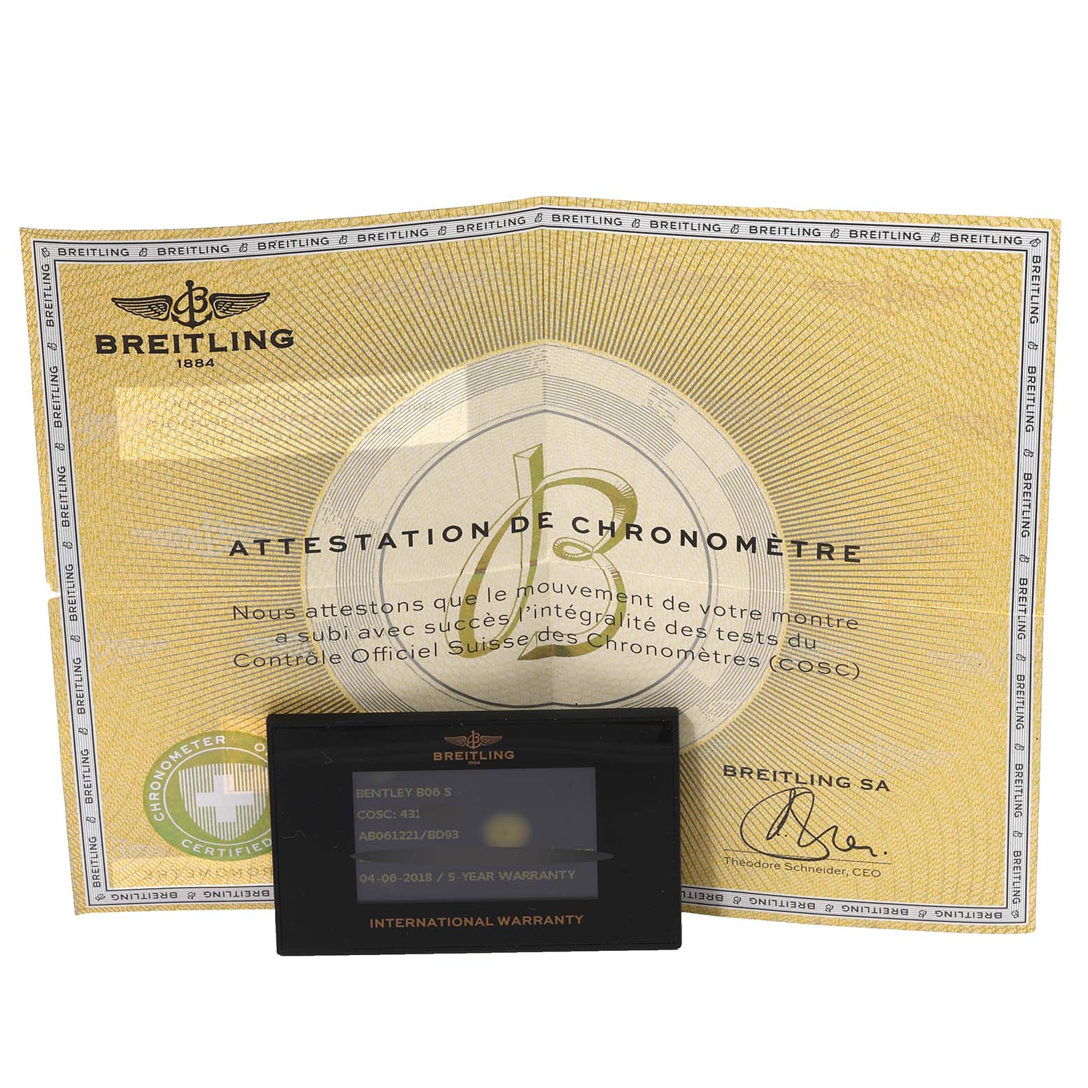 This image shows the warranty card and chronometer certification for the Bentley model by Breitling.