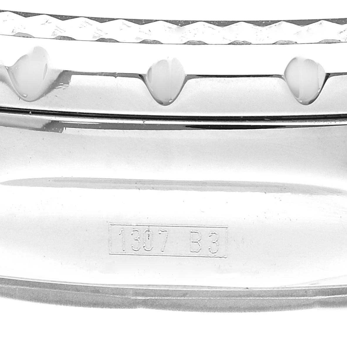 This image shows a close-up of the bezel and case edge of a Breitling Bentley A25362 Men's Stainless Steel Blue Dial A25362 Men's Stainless Steel Blue Dial model watch, highlighting its engraved details.