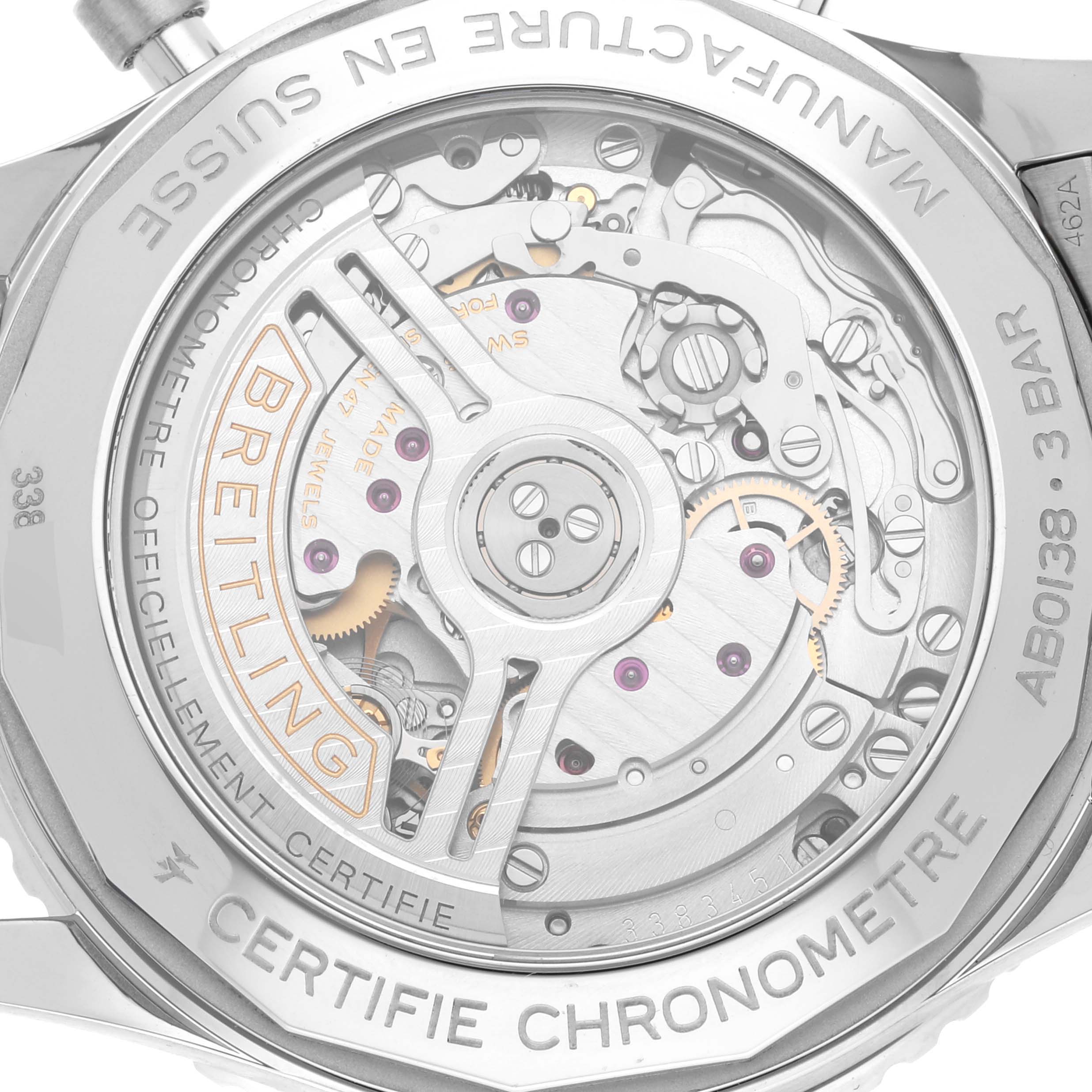 The image shows the back of a Breitling Navitimer AB0138 Men's Stainless Steel Blue Dial AB0138 Men's Stainless Steel Blue Dial watch, highlighting its mechanical movement and intricate details.