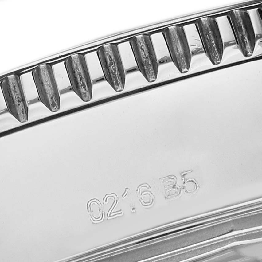 This image shows a close-up of the edge and engraving on a Breitling Superocean A17365 Men's Stainless Steel Black Dial A17365 Men's Stainless Steel Black Dial watch bezel.