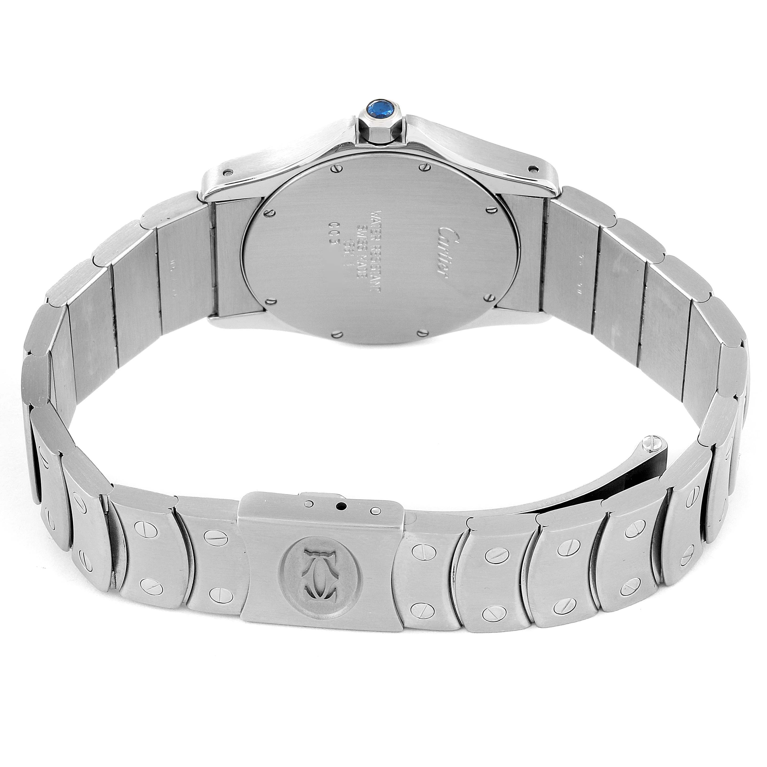 This image shows the back view of a Santos model watch by Cartier, highlighting the case back and metal bracelet with a clasp.