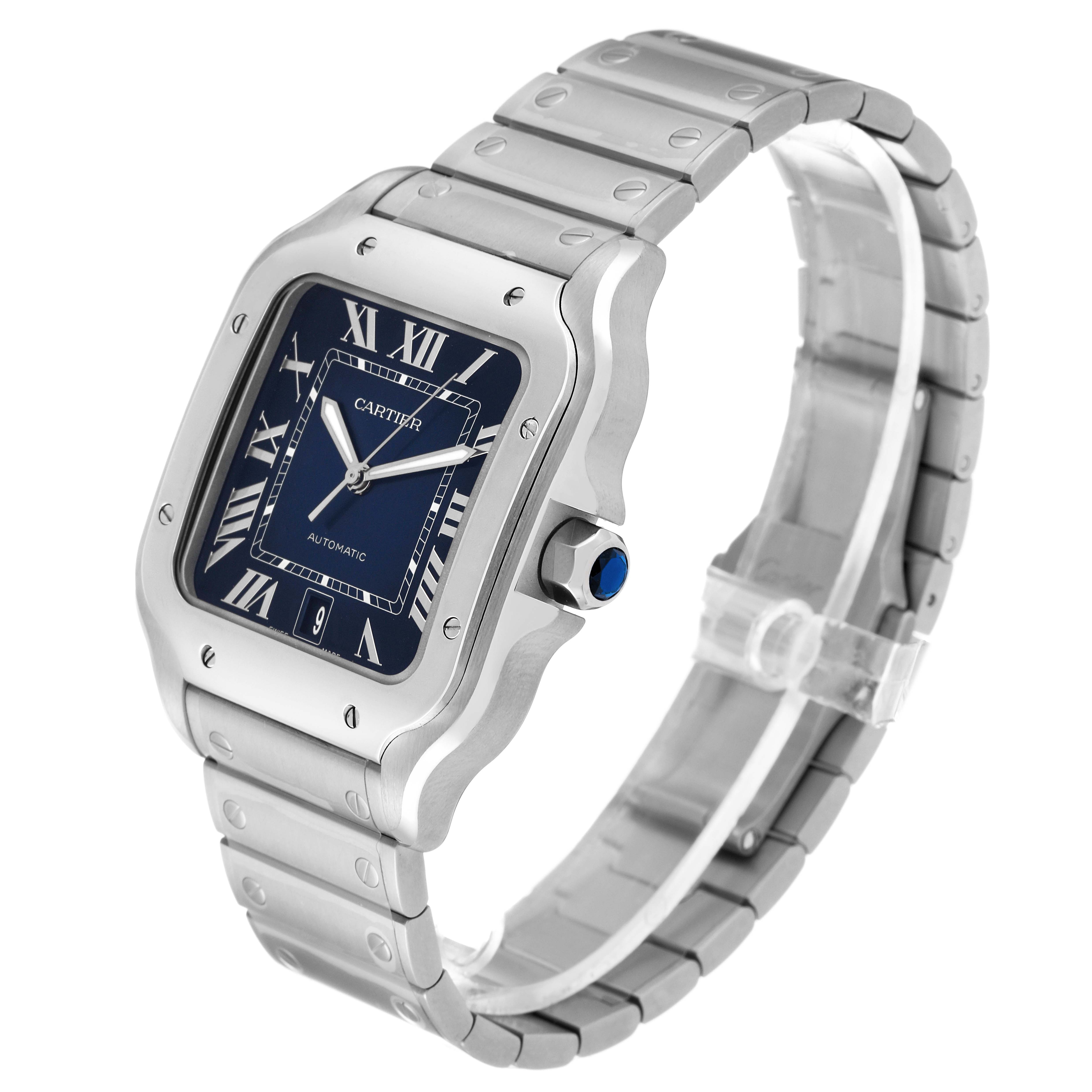 The image displays a Cartier Santos WSSA0030 Men's Stainless Steel Blue Dial WSSA0030 Men's Stainless Steel Blue Dial model watch angled slightly to the right, showcasing its face, bezel, and bracelet.