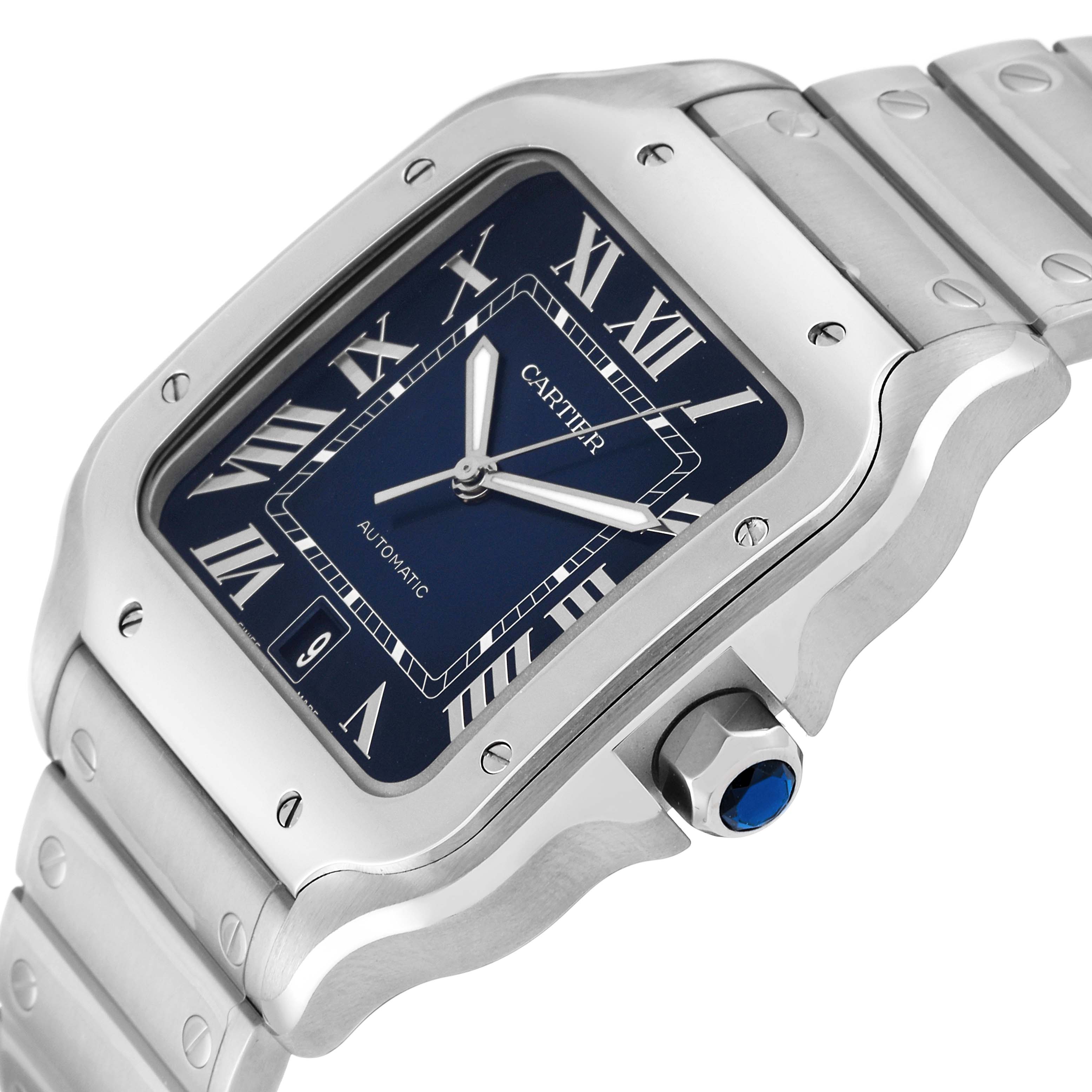 The image shows a close-up angle of the Cartier Santos WSSA0030 Men's Stainless Steel Blue Dial WSSA0030 Men's Stainless Steel Blue Dial watch face, case, and part of the bracelet.