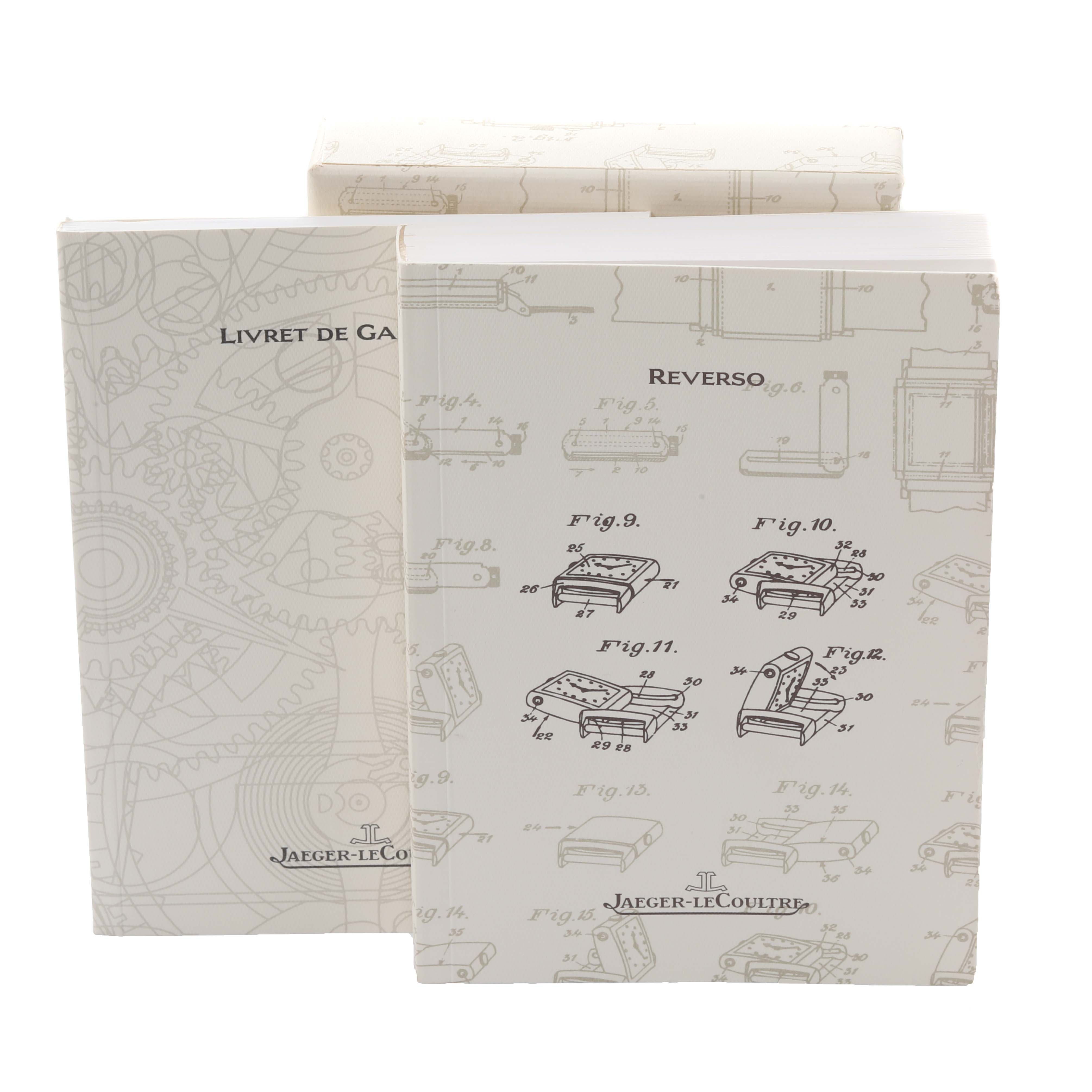 The image shows the packaging and manuals for a Jaeger-LeCoultre Reverso watch, featuring technical diagrams and branding.