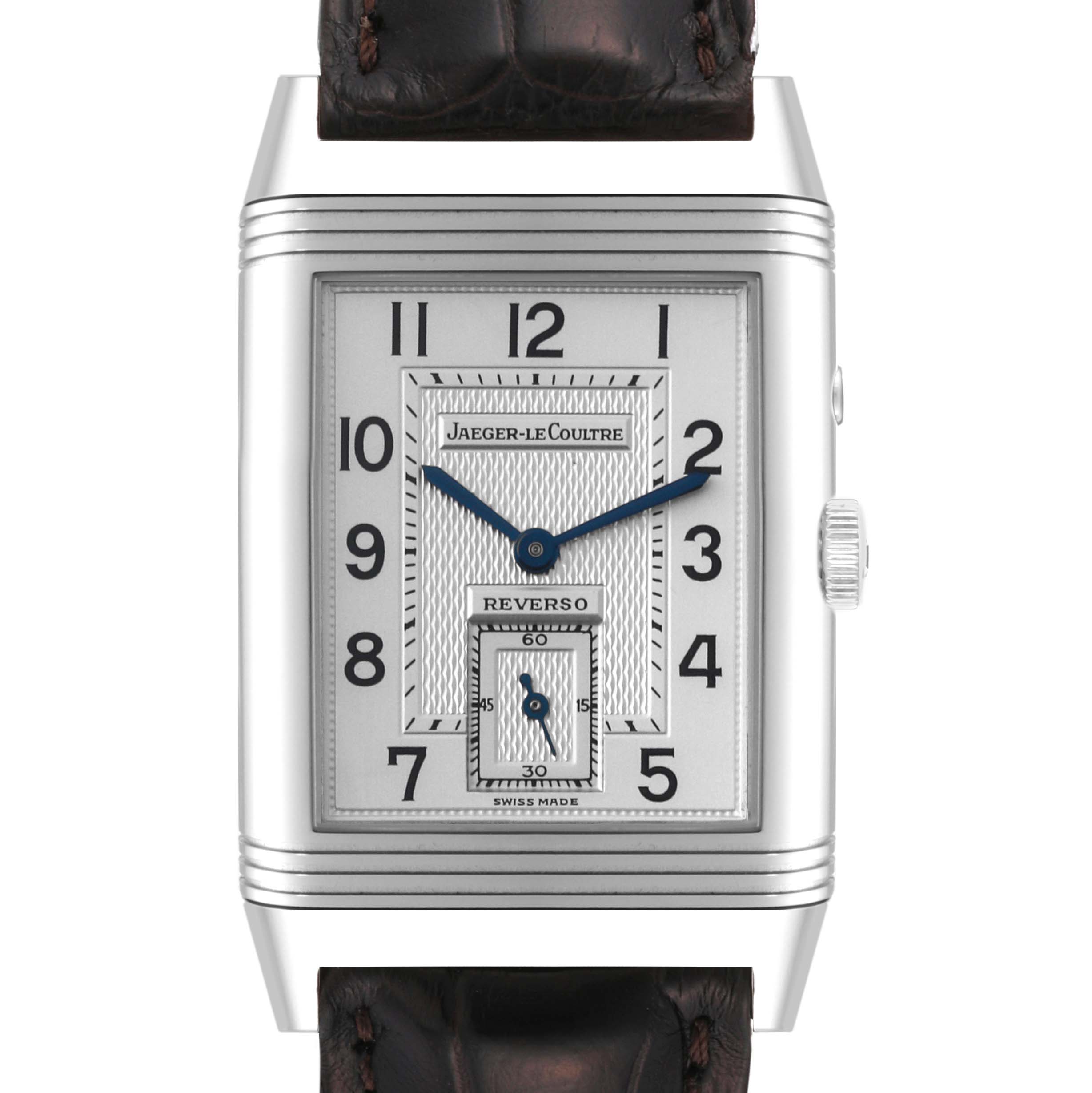 The image shows a front view of the Jaeger-LeCoultre Reverso watch, highlighting its dial, hands, and strap.