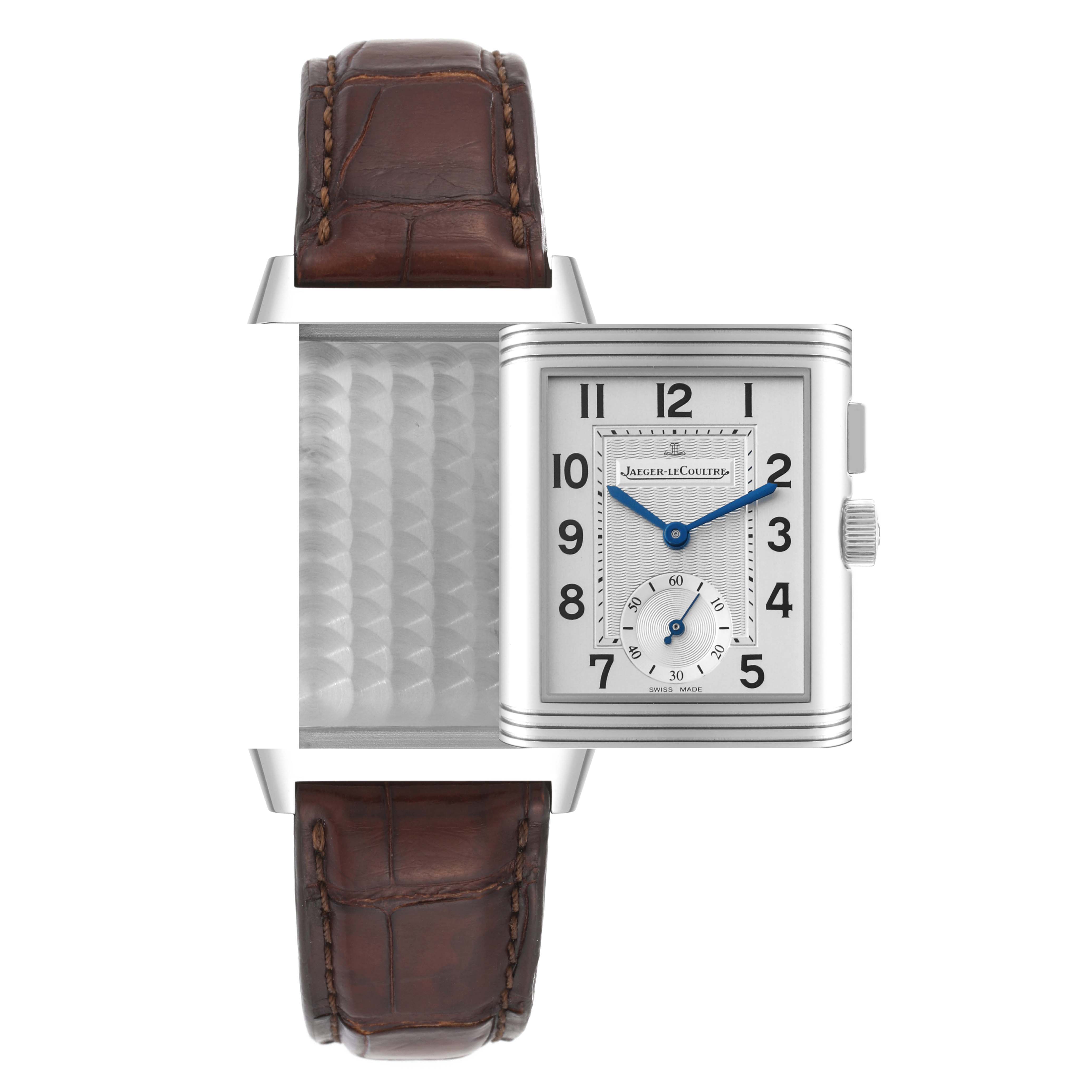 The image shows a front angle of the Jaeger-LeCoultre Reverso watch with its reversible case partially rotated and brown leather strap.