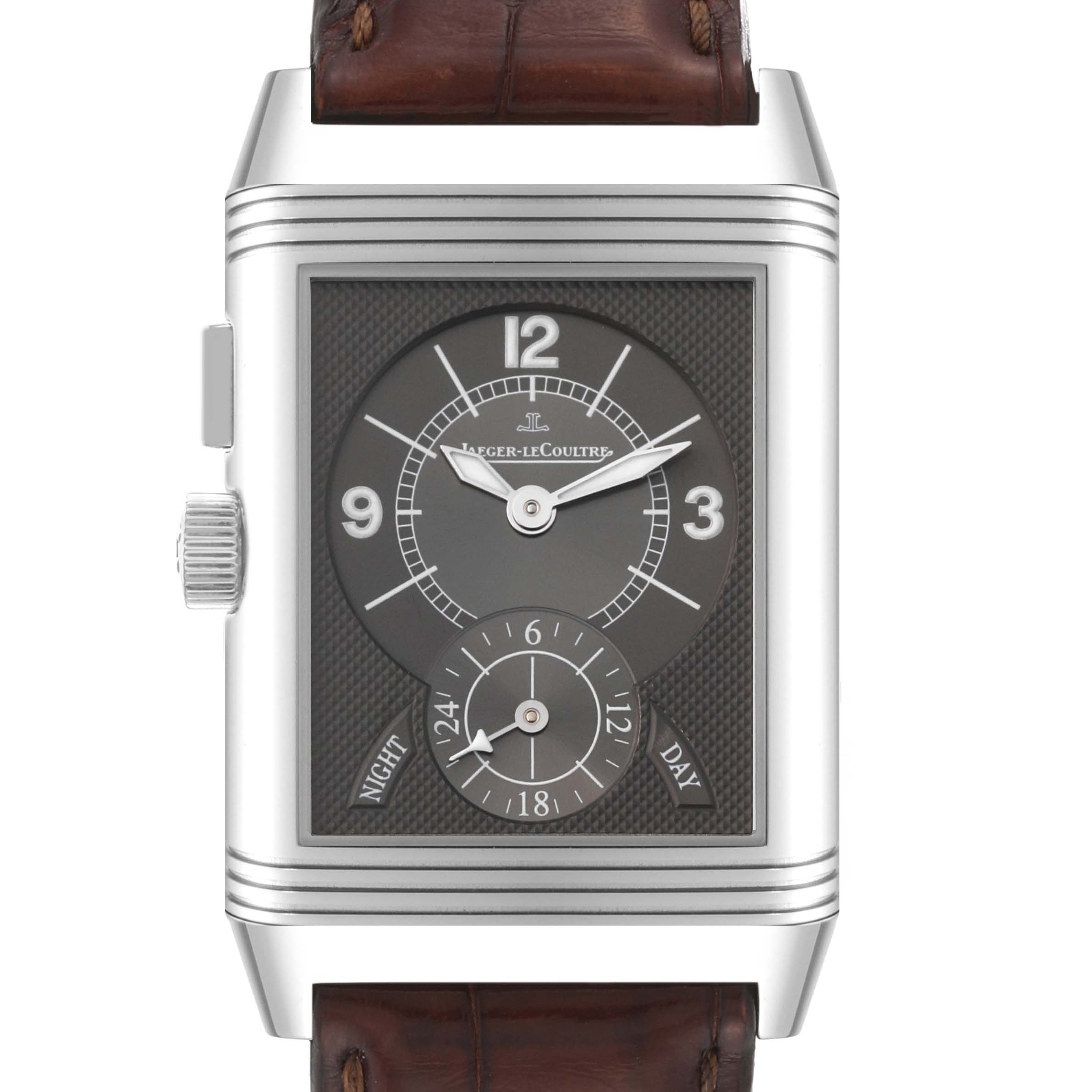 The Reverso model by Jaeger LeCoultre is shown from the front, displaying its dial, hands, subdial, and part of its leather strap.