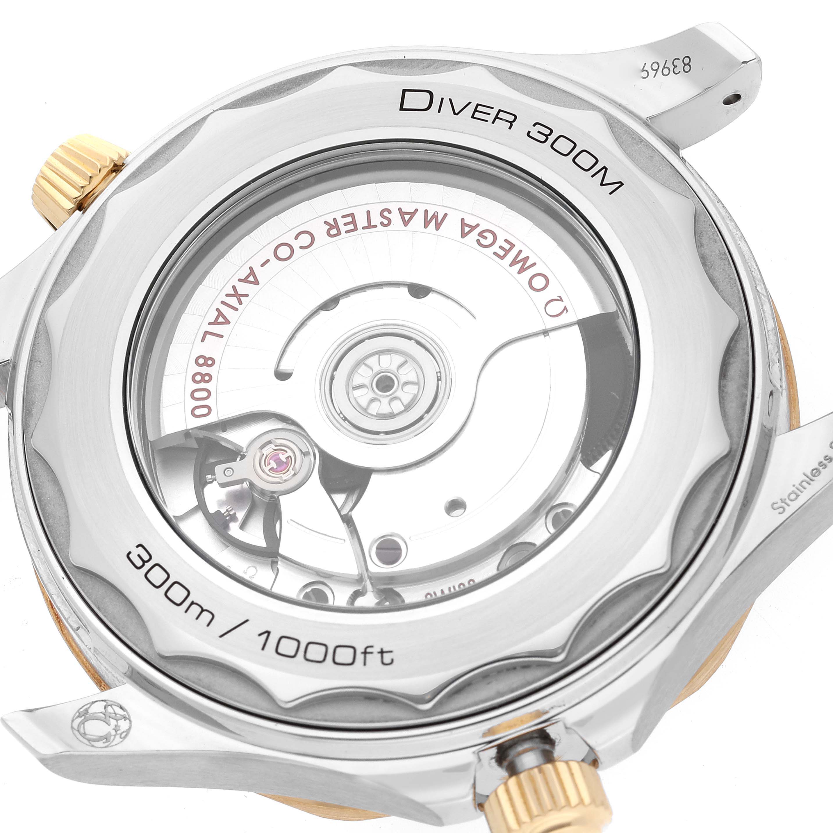 This image shows the back of an Omega Seamaster 210.22.42.20.01.001 Men's Steel and Gold (two tone) Black Dial 210.22.42.20.01.001 Men's Steel and Gold (two tone) Black Dial Diver 300M watch, highlighting its movement and engravings.