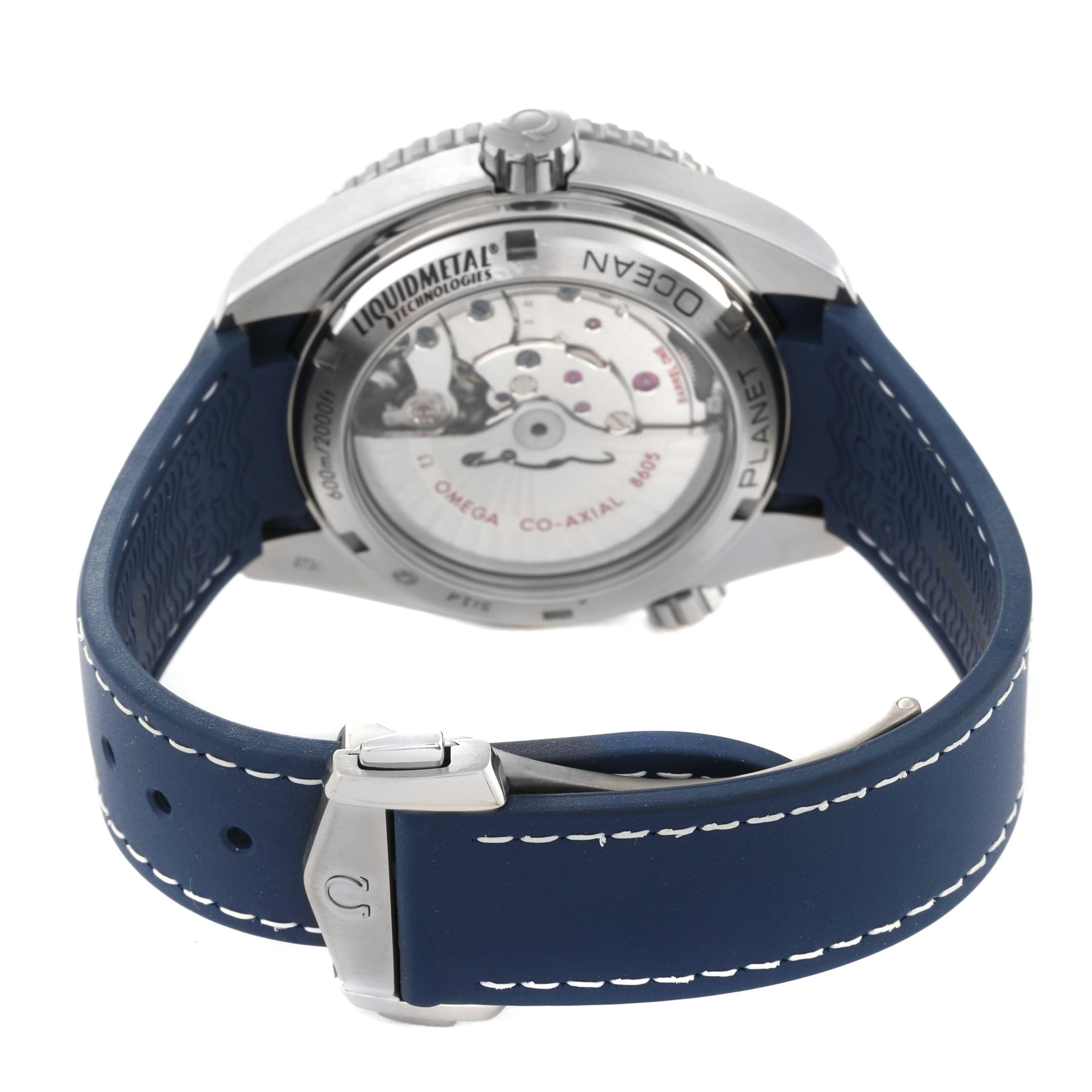 The image shows the back case and blue strap of the Omega Planet Ocean 232.92.44.22.03.001 Men
s Titanium Blue Dial 232.92.44.22.03.001 Men
s Titanium Blue Dial watch, highlighting the transparent case back and clasp.