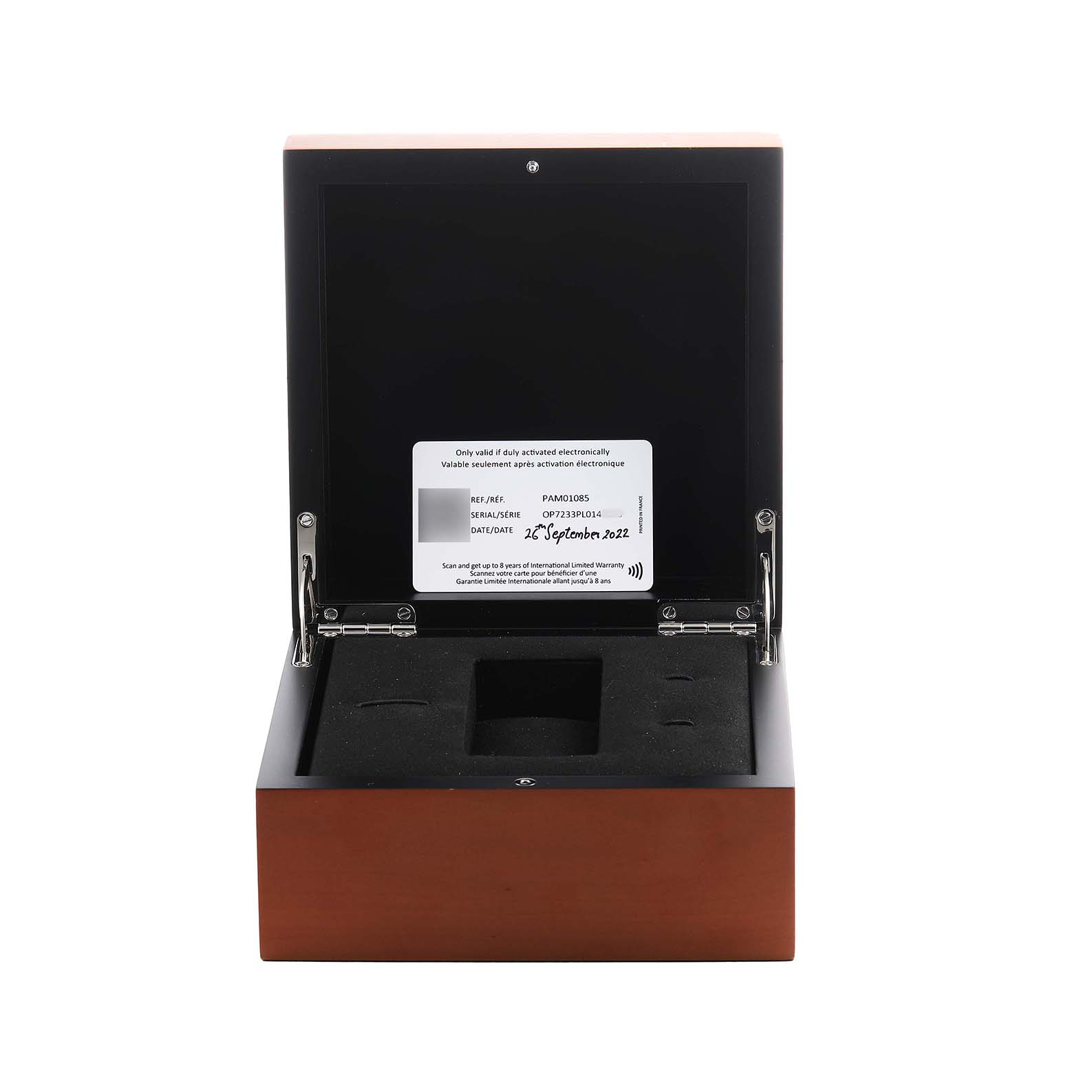 The image shows an open Panerai Luminor PAM01085 Men's Stainless Steel Blue Dial watch box with a warranty card visible inside the lid.