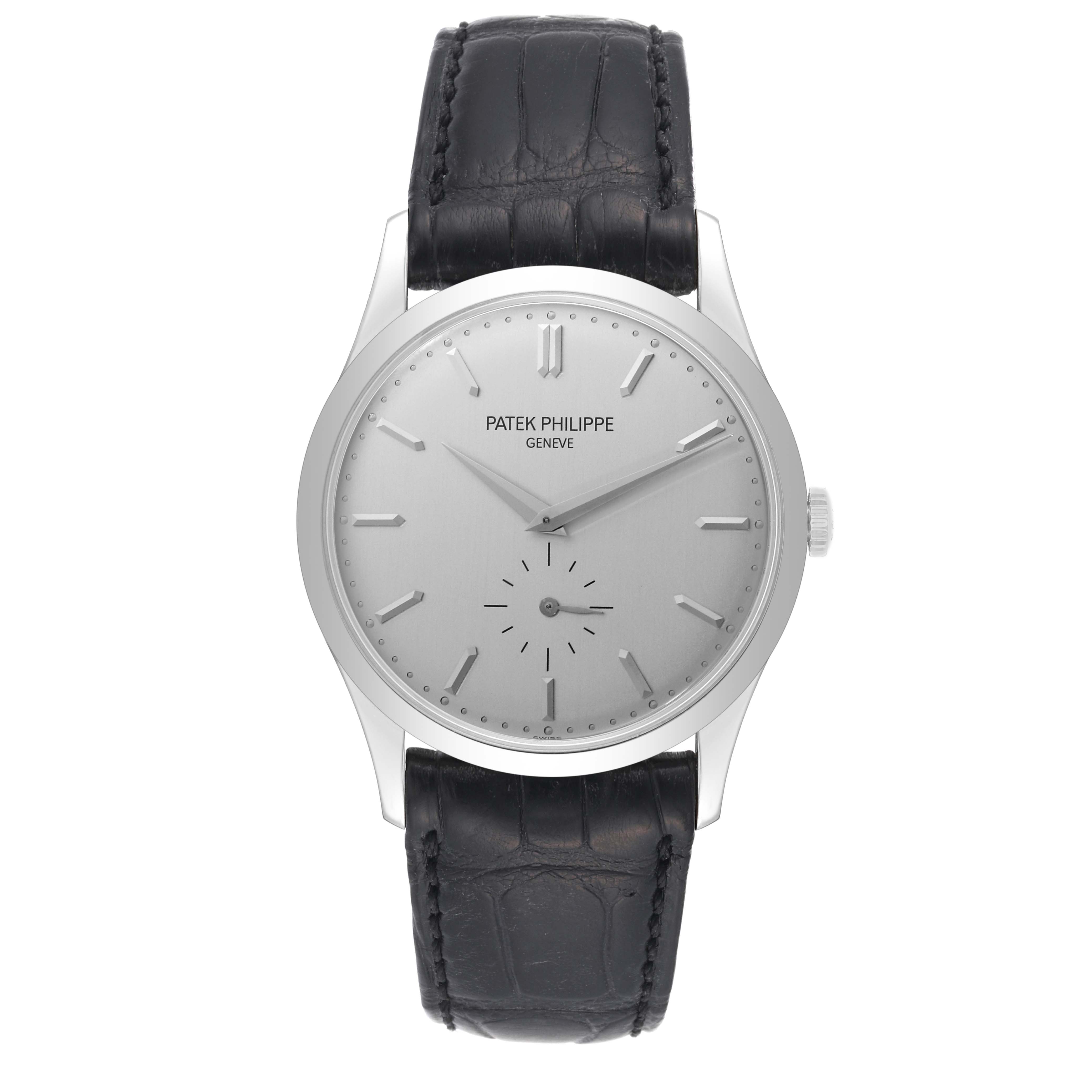 The image shows a front view of a Patek Philippe Calatrava 5196G Men
s White Gold Silver Dial 5196G Men
s White Gold Silver Dial watch, showcasing its dial and black leather strap.