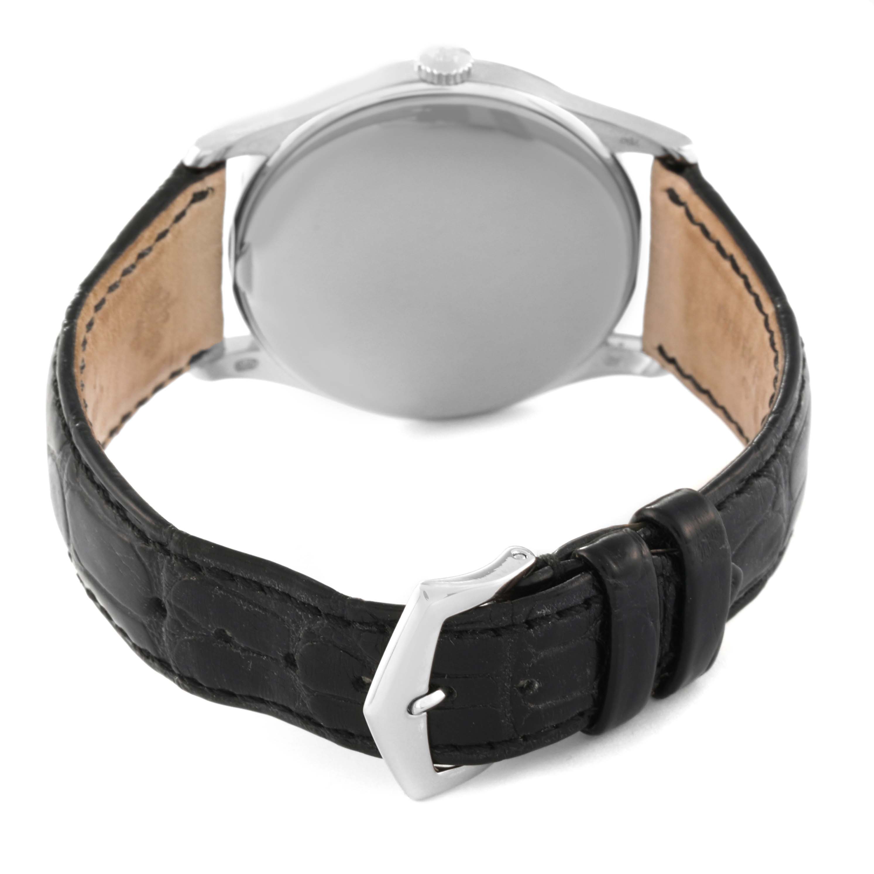 The image shows the back and side views of a Patek Philippe Calatrava 5196G Men
s White Gold Silver Dial 5196G Men
s White Gold Silver Dial watch, including its black leather strap and buckle.