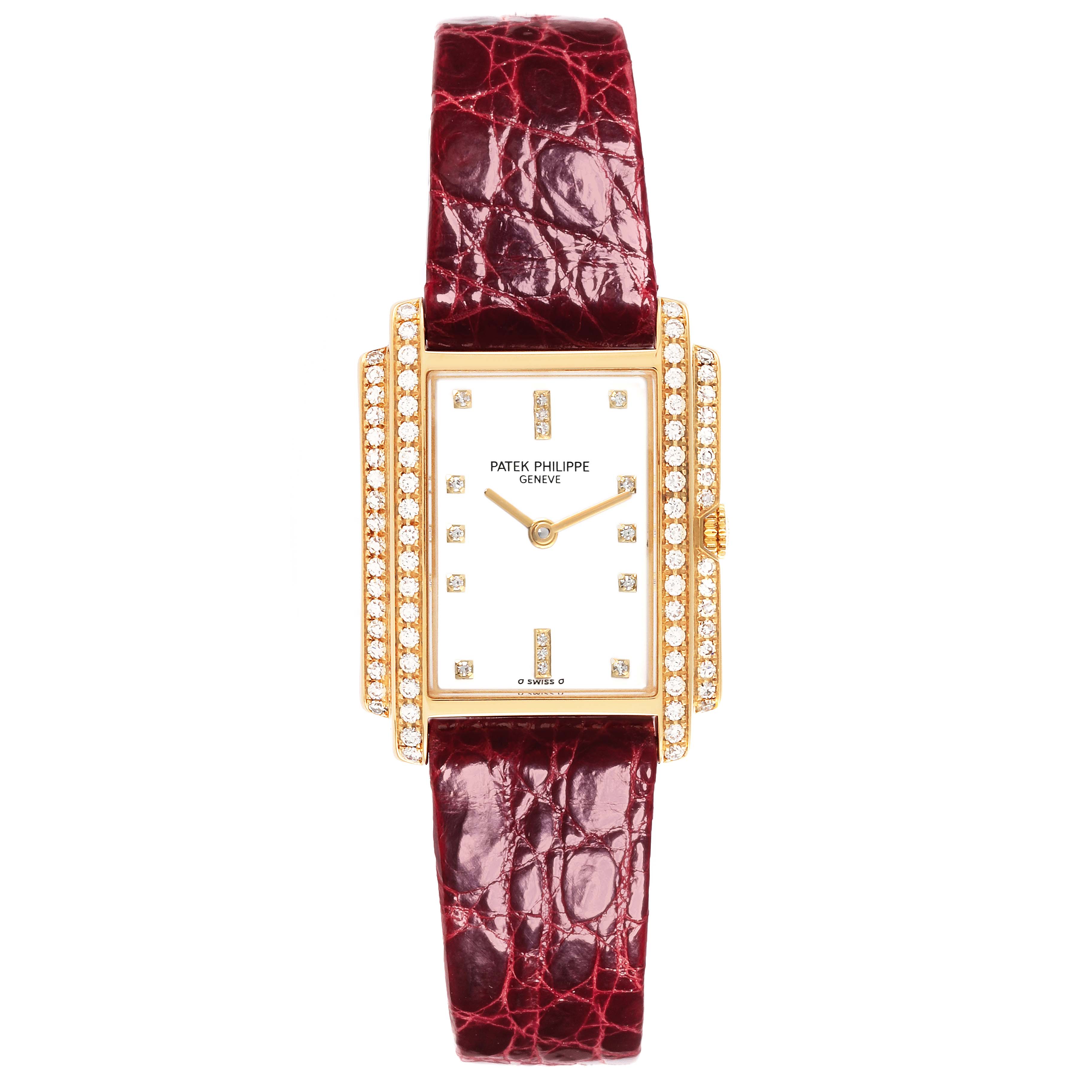 The Patek Philippe Gondolo 4825/101J Women's Yellow Gold White Dial 4825/101J Women's Yellow Gold White Dial watch is shown from a front angle, featuring a diamond-studded gold case and burgundy leather strap.
