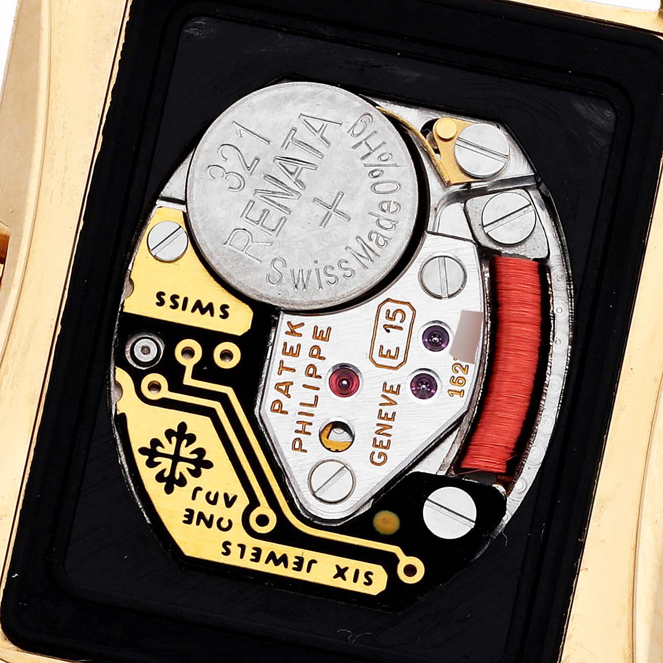 This image shows the back of a Patek Philippe Gondolo 4825/101J Women's Yellow Gold White Dial 4825/101J Women's Yellow Gold White Dial watch, highlighting its battery and internal mechanics.
