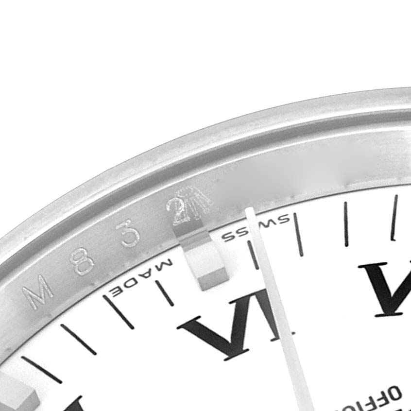The image shows a close-up of the dial, bezel, and part of the Roman numeral "VI" on the Rolex Air-King 114200 Men's Stainless Steel White Dial 114200 Men's Stainless Steel White Dial watch.