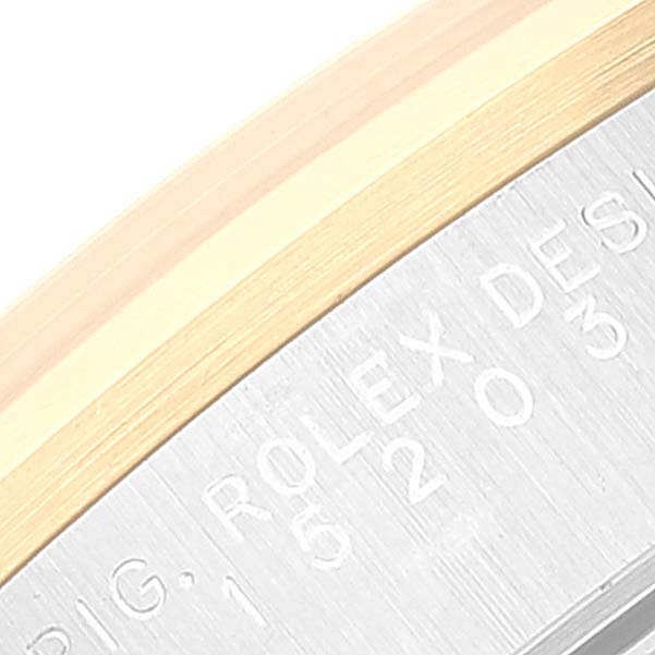 The image shows a close-up angle of a Rolex Date 15203 Men's Steel and Gold (two tone) Blue Dial 15203 Men's Steel and Gold (two tone) Blue Dial watch, focusing on the engraved markings on its side.