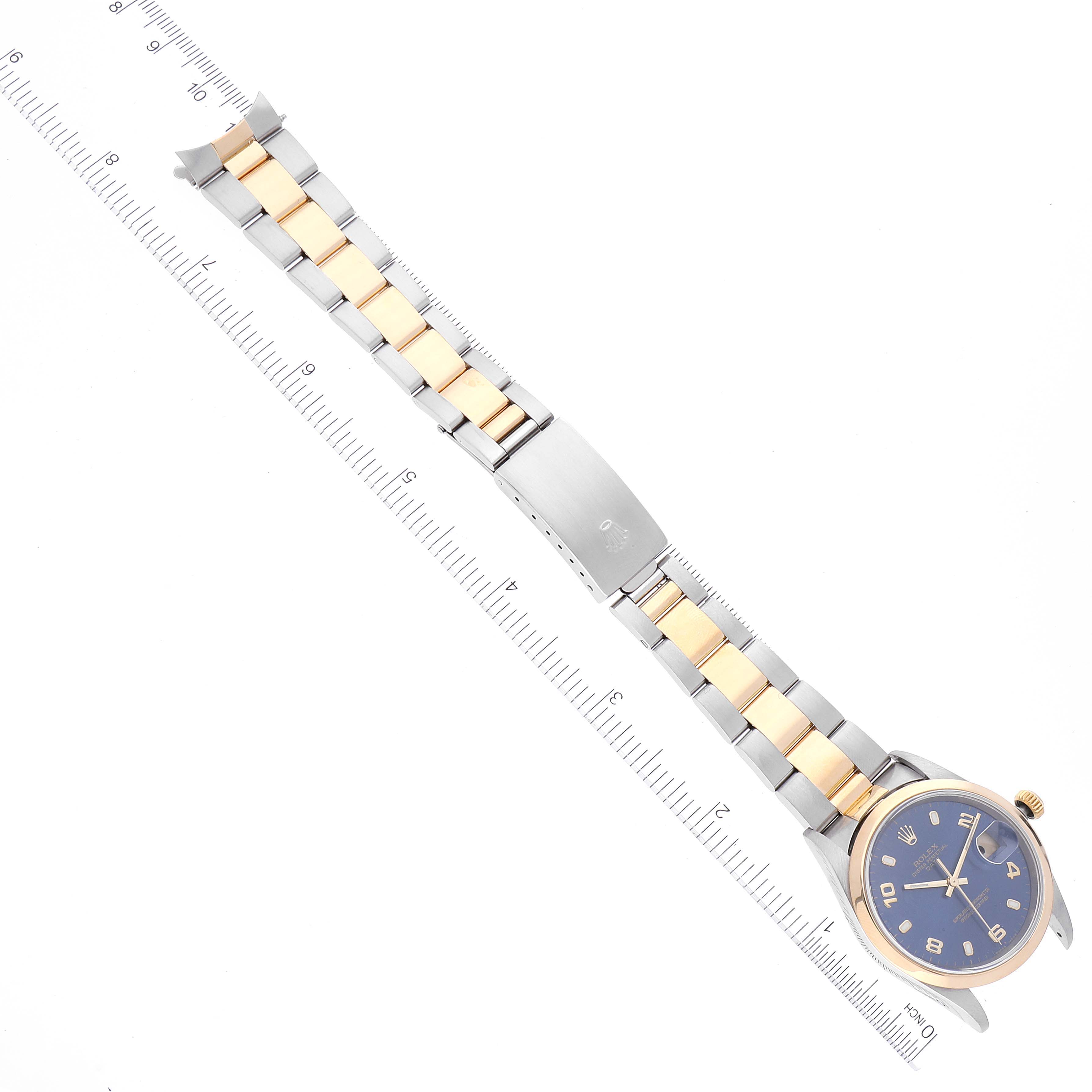 The image shows a top-down view of a Rolex Date 15203 Men's Steel and Gold (two tone) Blue Dial 15203 Men's Steel and Gold (two tone) Blue Dial model watch, highlighting the face, bezel, and two-tone bracelet.