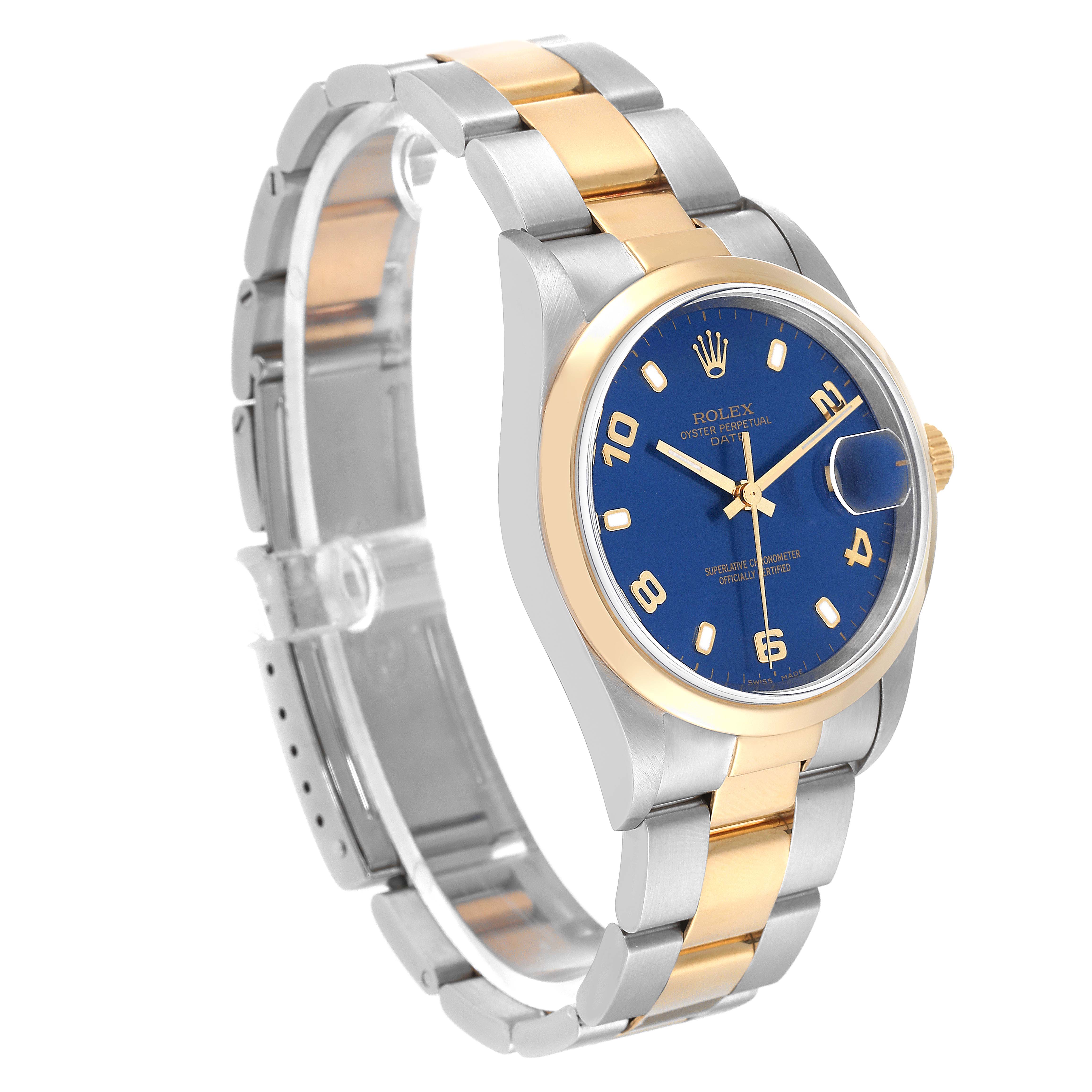 This image shows a Rolex Date 15203 Men's Steel and Gold (two tone) Blue Dial 15203 Men's Steel and Gold (two tone) Blue Dial model watch at a slight angle, displaying its blue dial, two-tone band, and case.