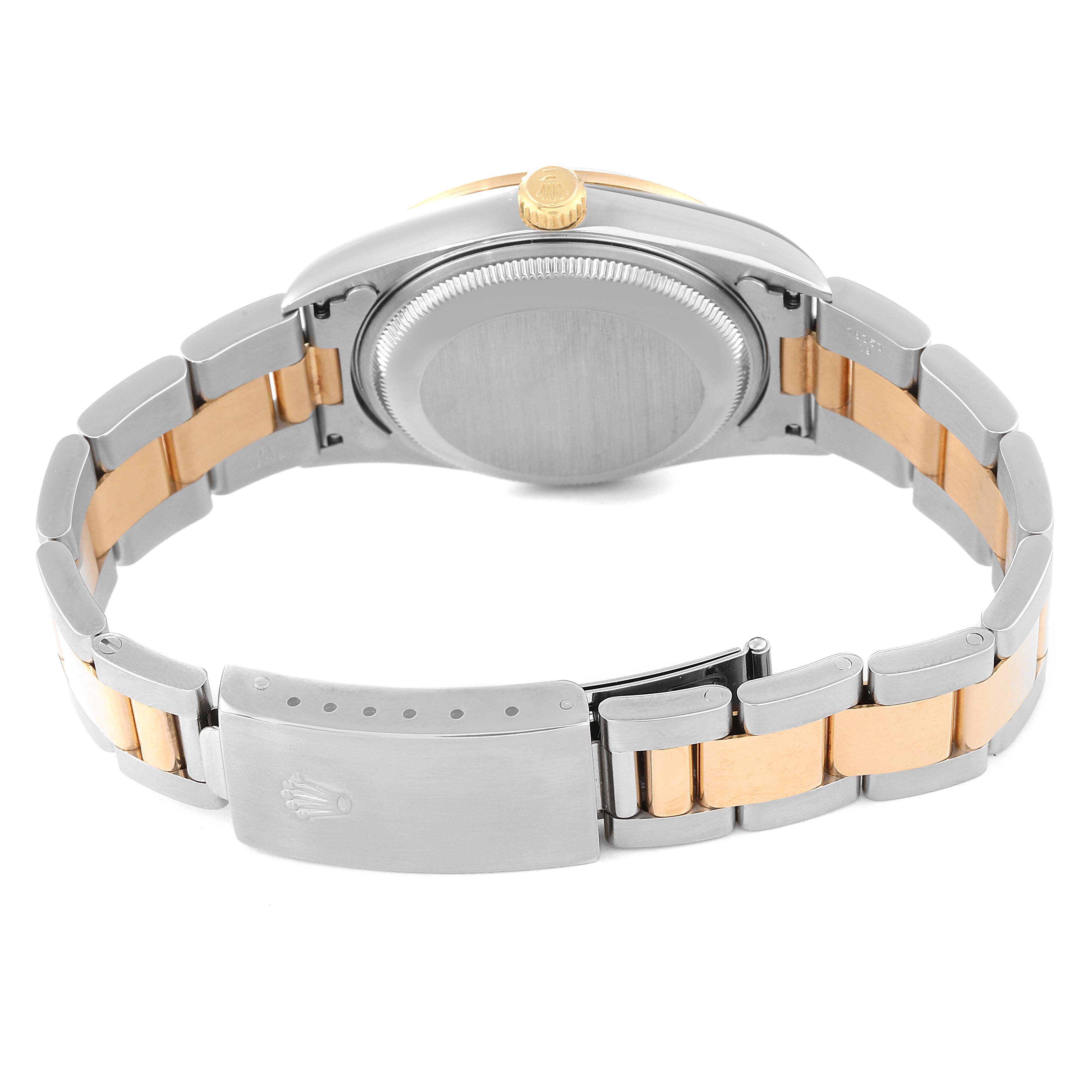 The image shows the back view of a Rolex Date 15203 Men's Steel and Gold (two tone) Blue Dial 15203 Men's Steel and Gold (two tone) Blue Dial model watch, highlighting the clasp, case back, and part of the bracelet.