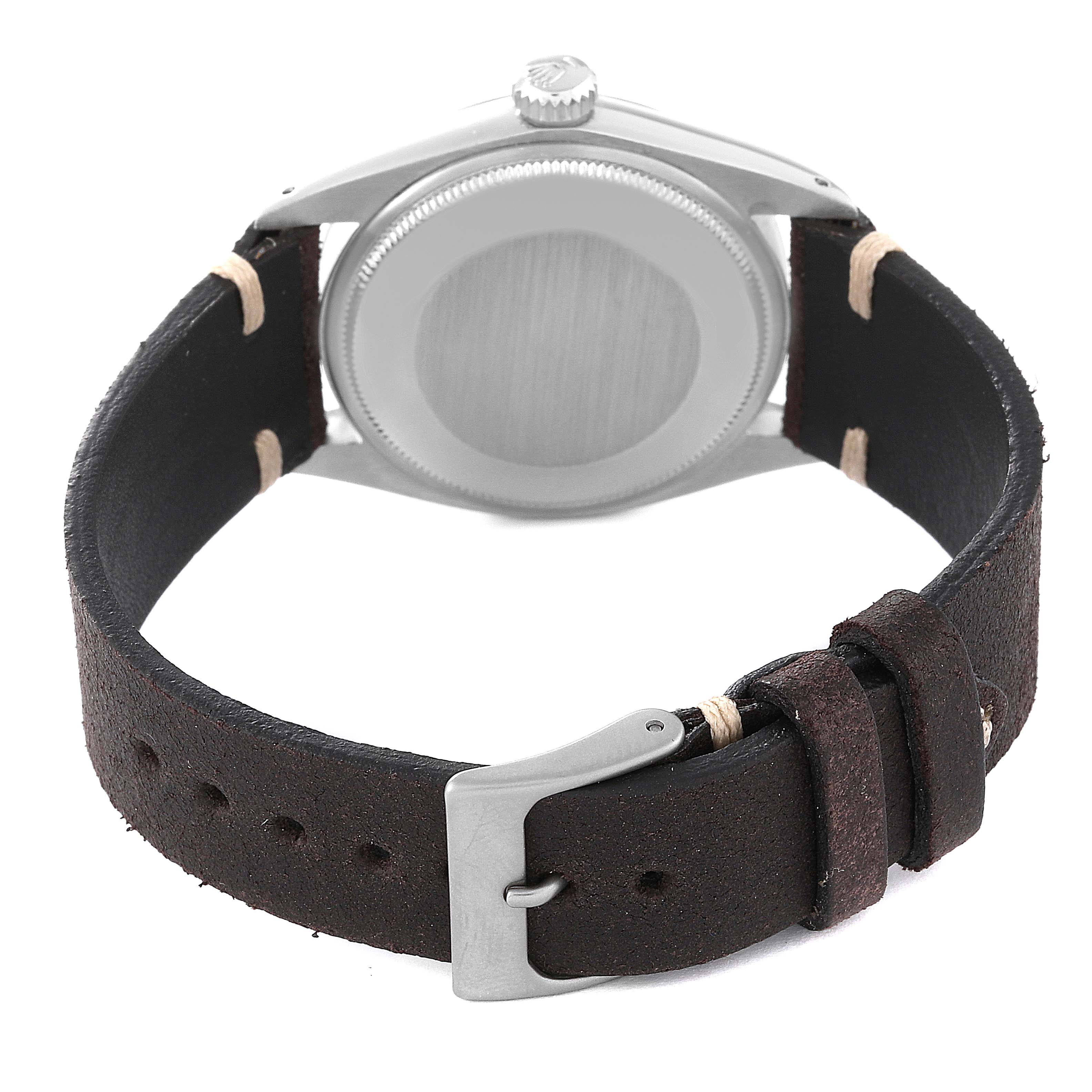 The Rolex Date 1500 Men
s Stainless Steel Silver Dial 1500 Men
s Stainless Steel Silver Dial model watch is shown from the back, highlighting its case and leather strap with a metal buckle.