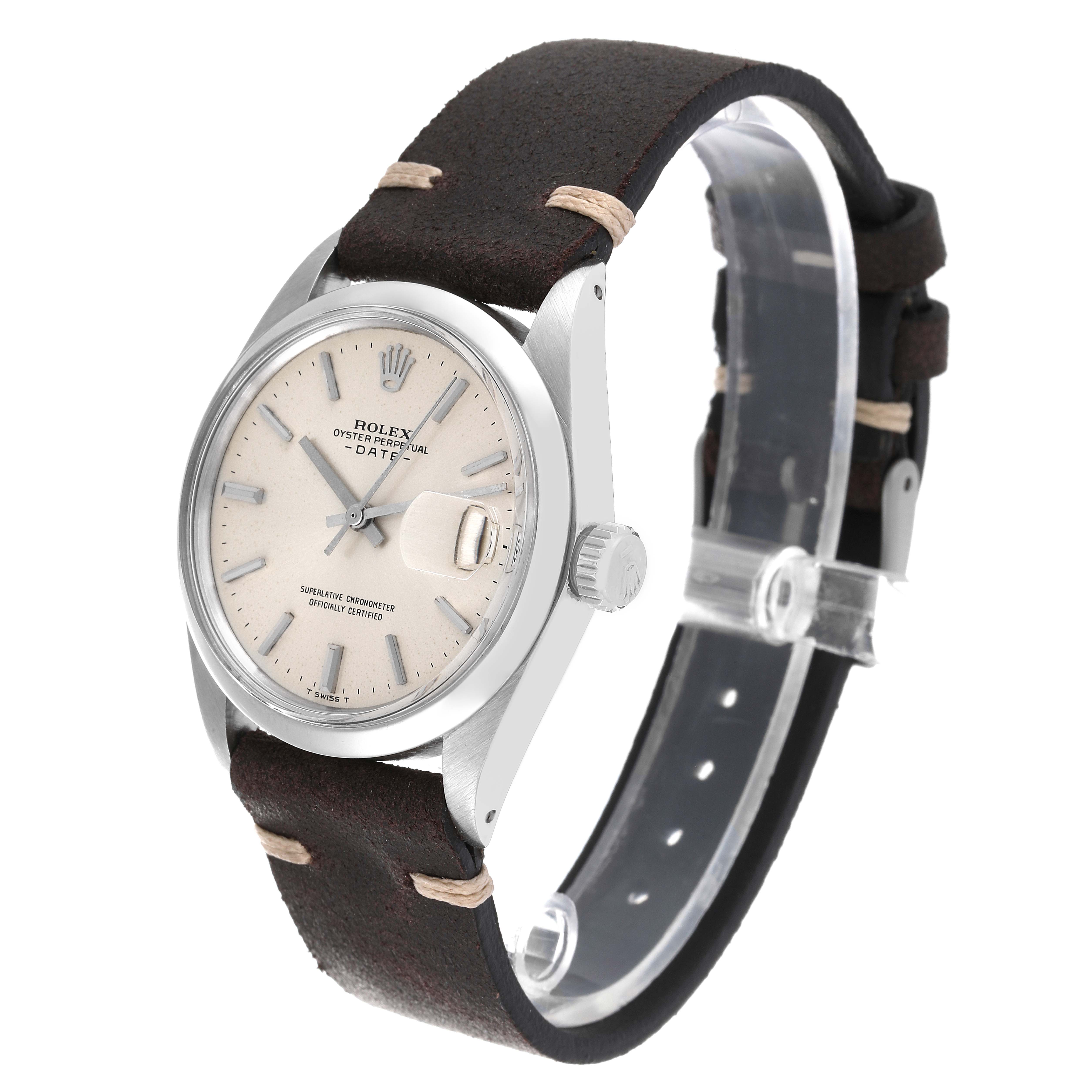 This is a Rolex Date 1500 Men
s Stainless Steel Silver Dial 1500 Men
s Stainless Steel Silver Dial model watch shown at a three-quarter angle, highlighting its dial, bezel, crown, and leather strap.