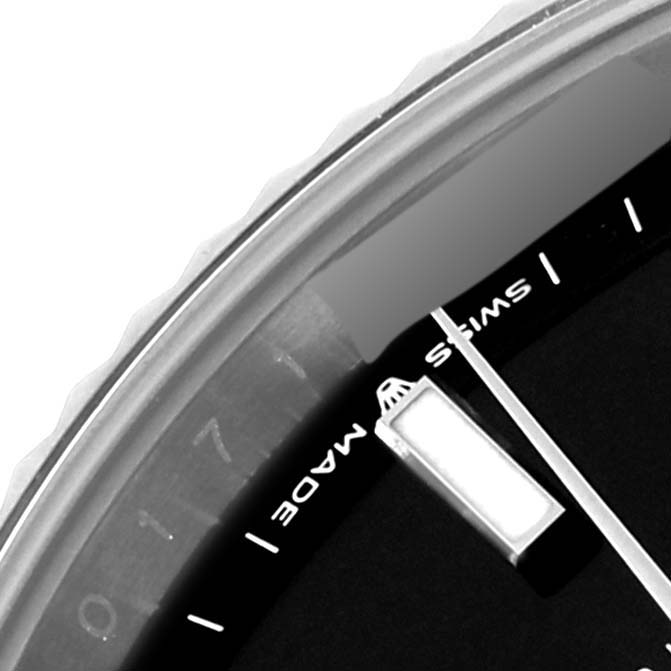 This close-up angle shows part of the dial and bezel of the Rolex Datejust 41 126334 Men
s Stainless Steel Black Dial 126334 Men
s Stainless Steel Black Dial watch, with the "Swiss Made" text visible.