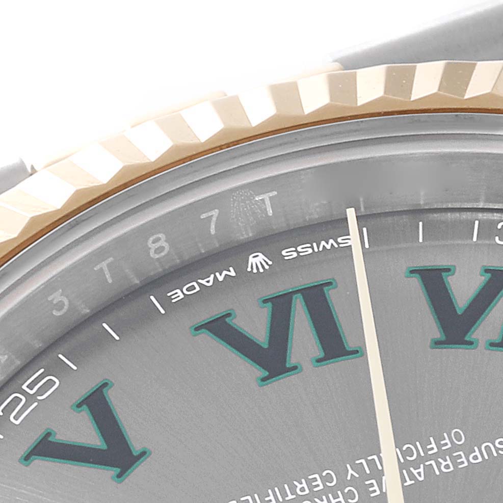 This image shows a close-up view of the dial and fluted bezel of a Rolex Datejust 41 126333 Men's Steel and Gold (two tone) Grey Dial 126333 Men's Steel and Gold (two tone) Grey Dial watch.