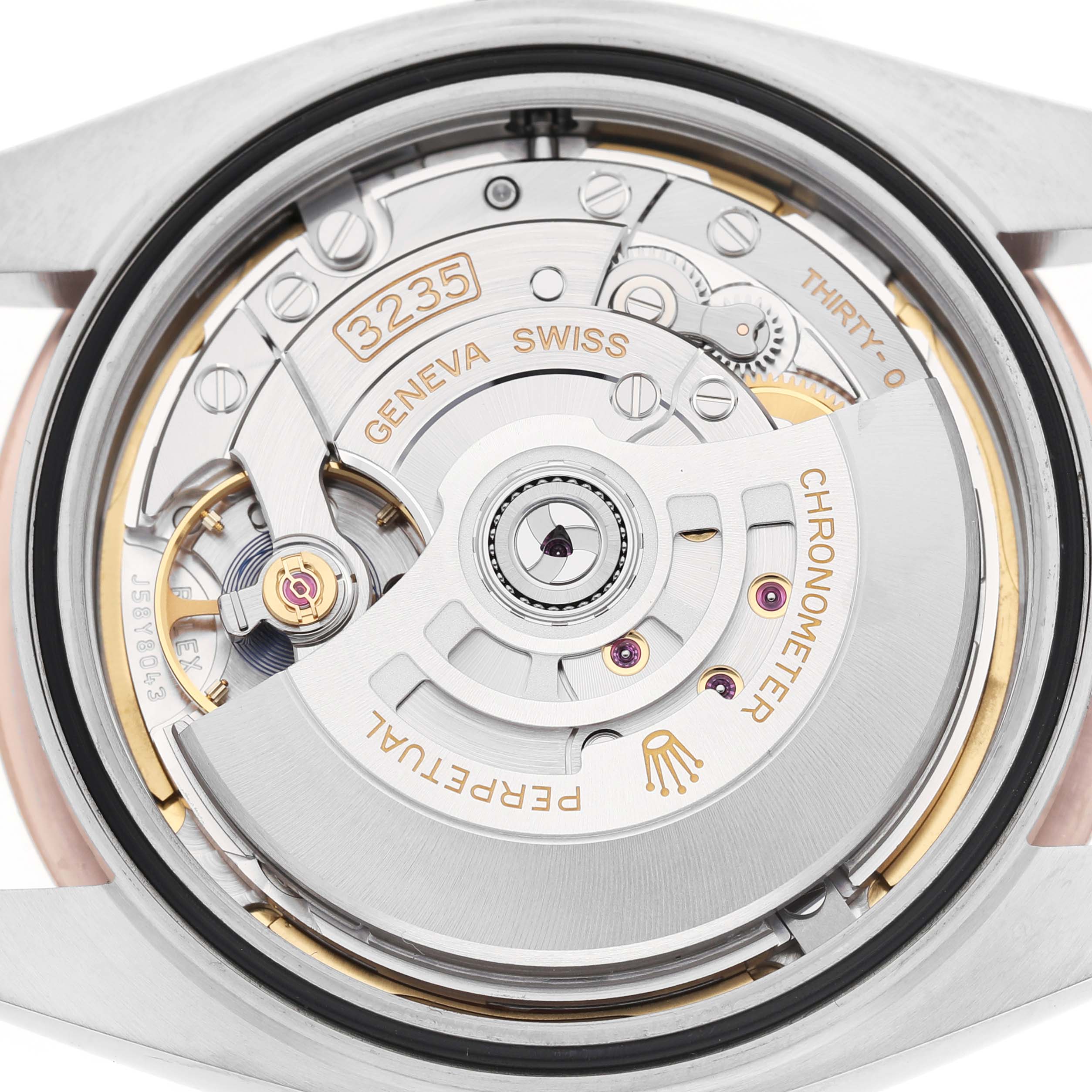 The image shows the movement mechanism of the Rolex Datejust 41 126301 Men's Steel and Gold (two tone) Grey Dial from a top view, highlighting the rotor and intricate components.