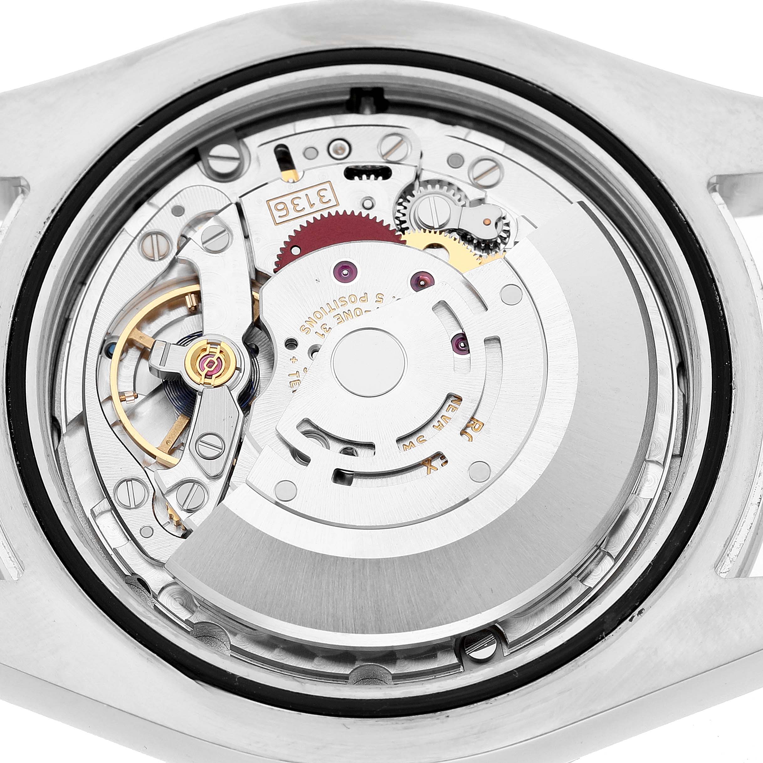 The image shows a close-up view of the Rolex Datejust 41 116300 Men's Stainless Steel Black Dial's movement and internal mechanism.