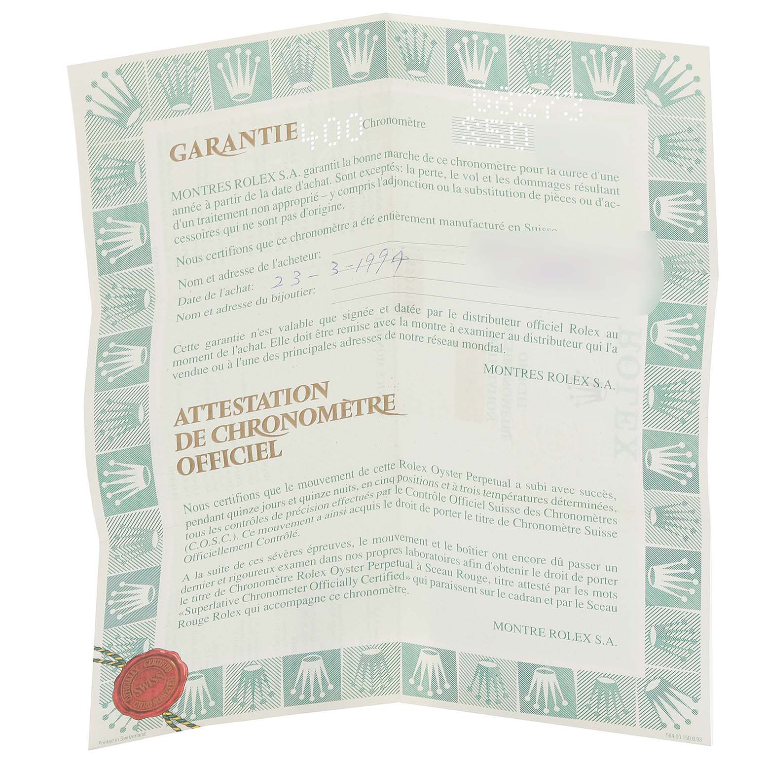 The image shows an official chronometer certificate for a Mid-Size Rolex watch, featuring the brand's crown logos and textual details.