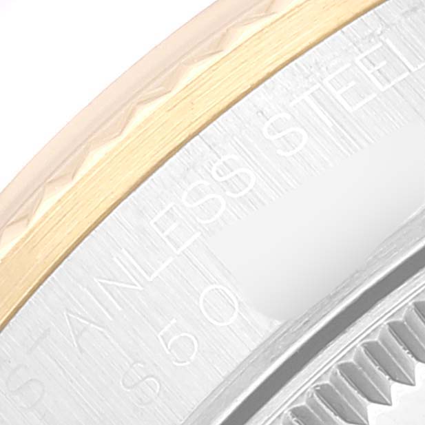 The image shows the side angle of a Mid-Size Rolex watch case, highlighting the stainless steel and gold details.