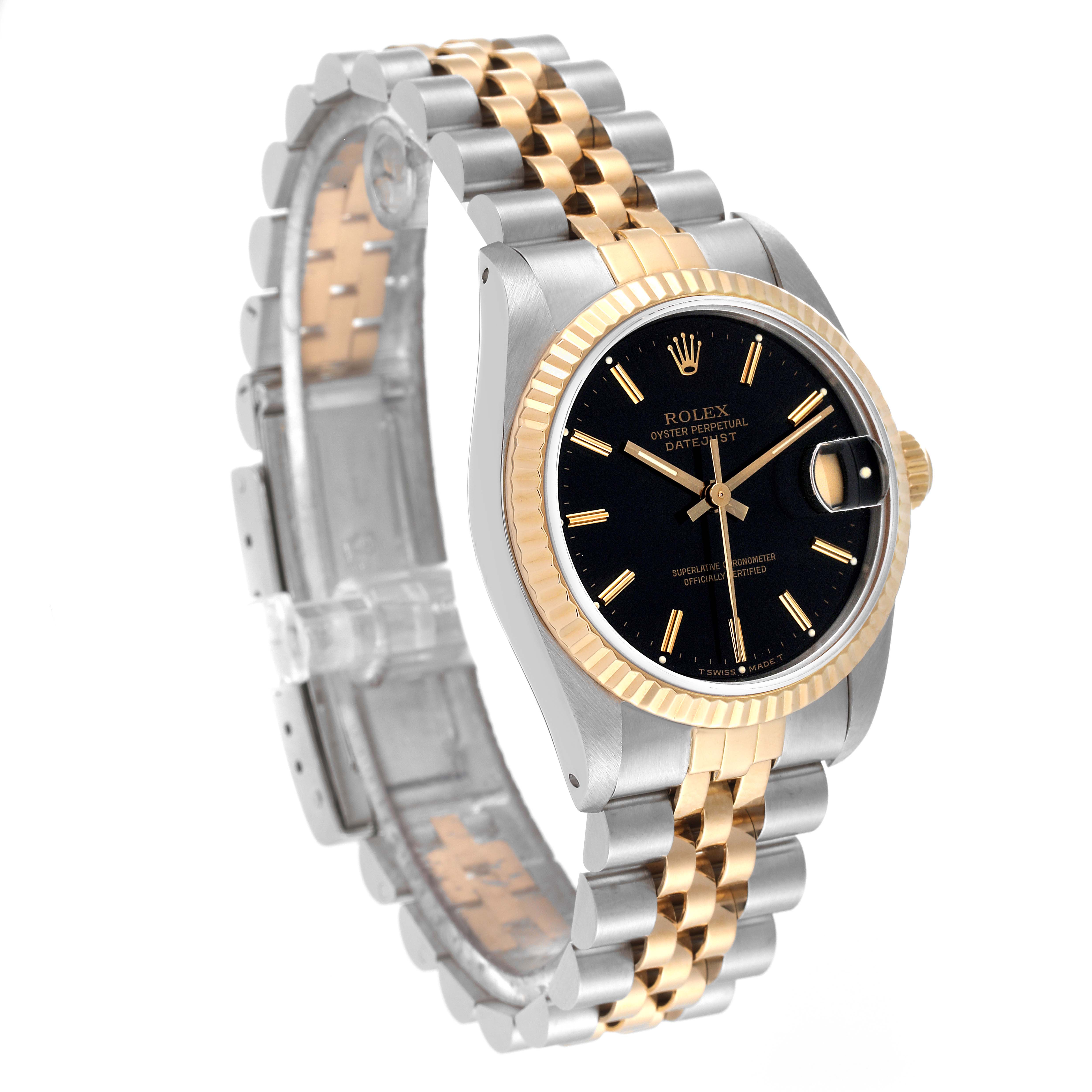 The image shows a Rolex Mid-Size 68273 Women
s Steel and Gold (two tone) Black Dial 68273 Women
s Steel and Gold (two tone) Black Dial Datejust watch at a front angle, highlighting the two-tone bracelet, black dial, and fluted bezel.