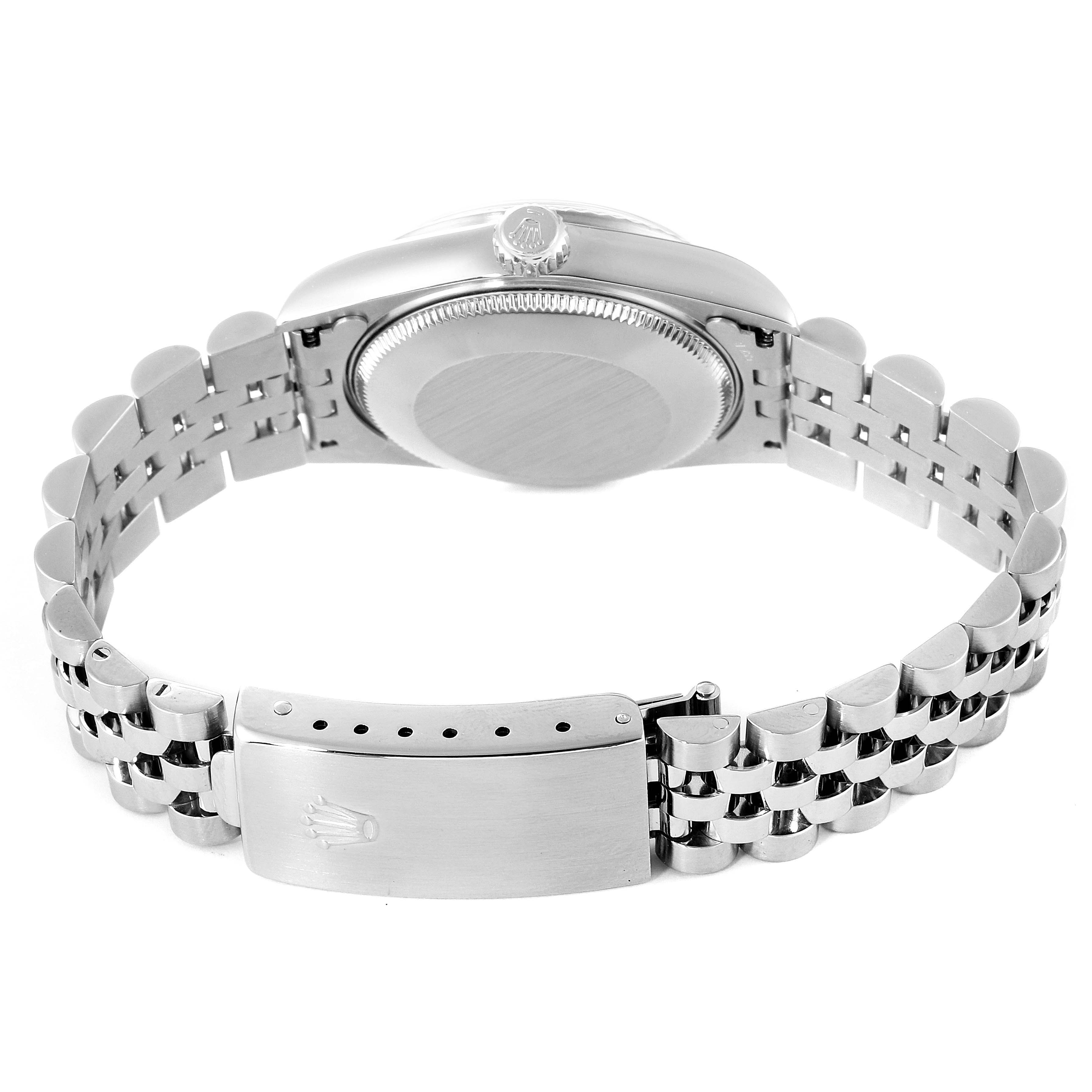 The image shows the case back and clasp of a Rolex Mid-Size 78274 Women
s Stainless Steel Silver Dial 78274 Women
s Stainless Steel Silver Dial watch from a rear angle.