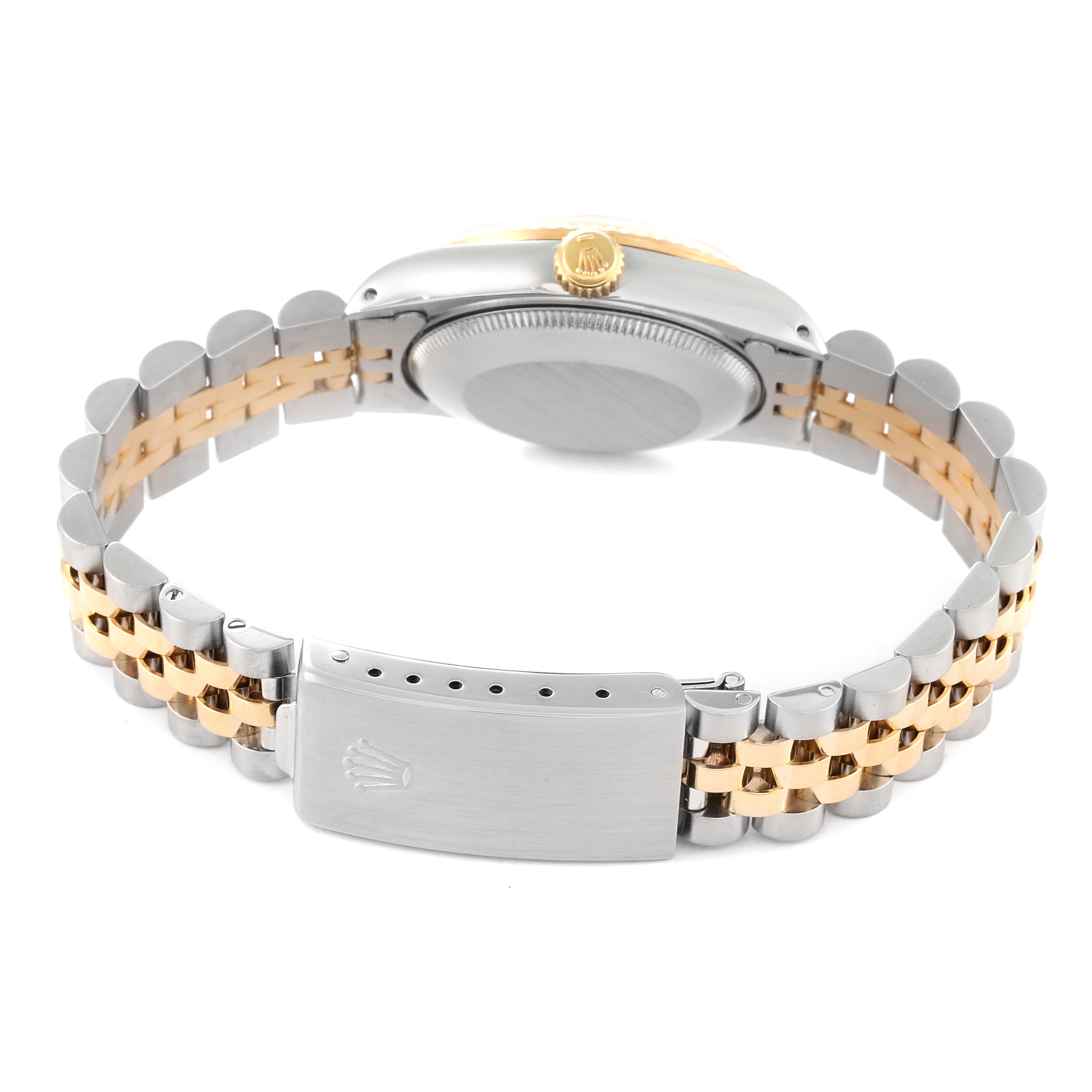 The image shows the back of a Rolex Mid-Size 68273 Women
s Steel and Gold (two tone) Champagne Dial 68273 Women
s Steel and Gold (two tone) Champagne Dial model watch, displaying its closed clasp and two-tone bracelet.
