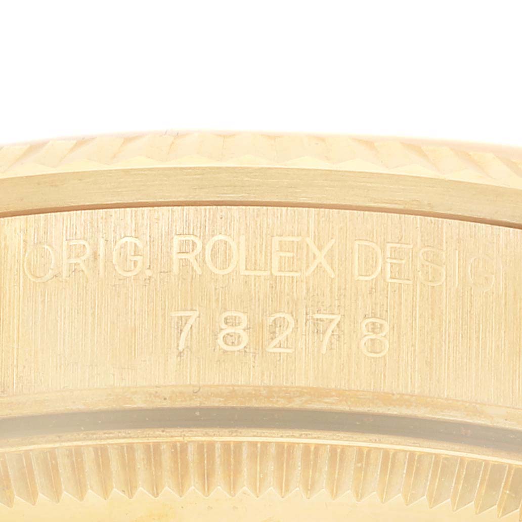 The image shows a close-up of the side engraving and bezel of the Rolex President 78278 Women's Yellow Gold Champagne Dial 78278 Women's Yellow Gold Champagne Dial model 78278.