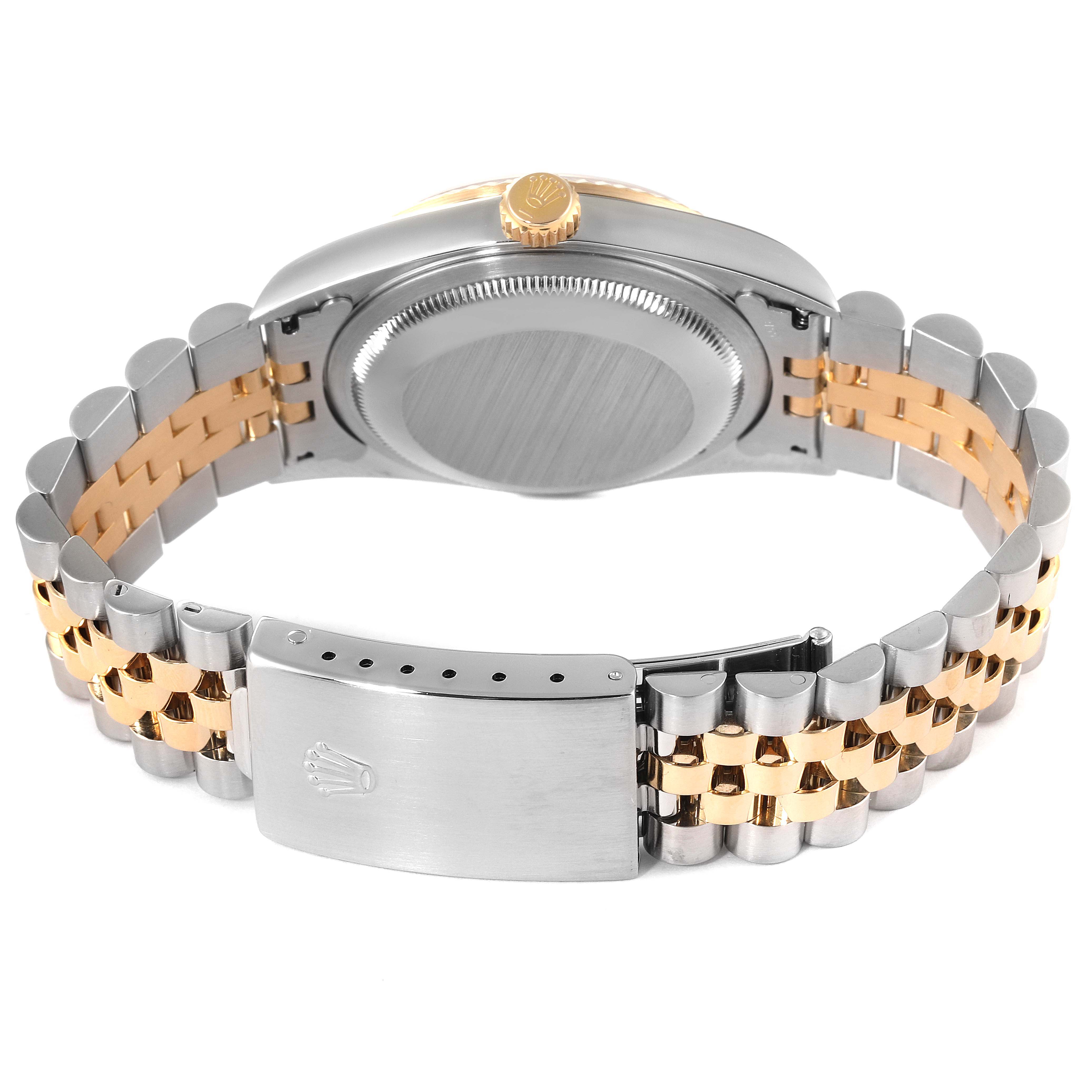 The image shows the back case and bracelet clasp of a Rolex Datejust 16233 Men's Steel and Gold (two tone) Black Dial 16233 Men's Steel and Gold (two tone) Black Dial watch from a rear angle.