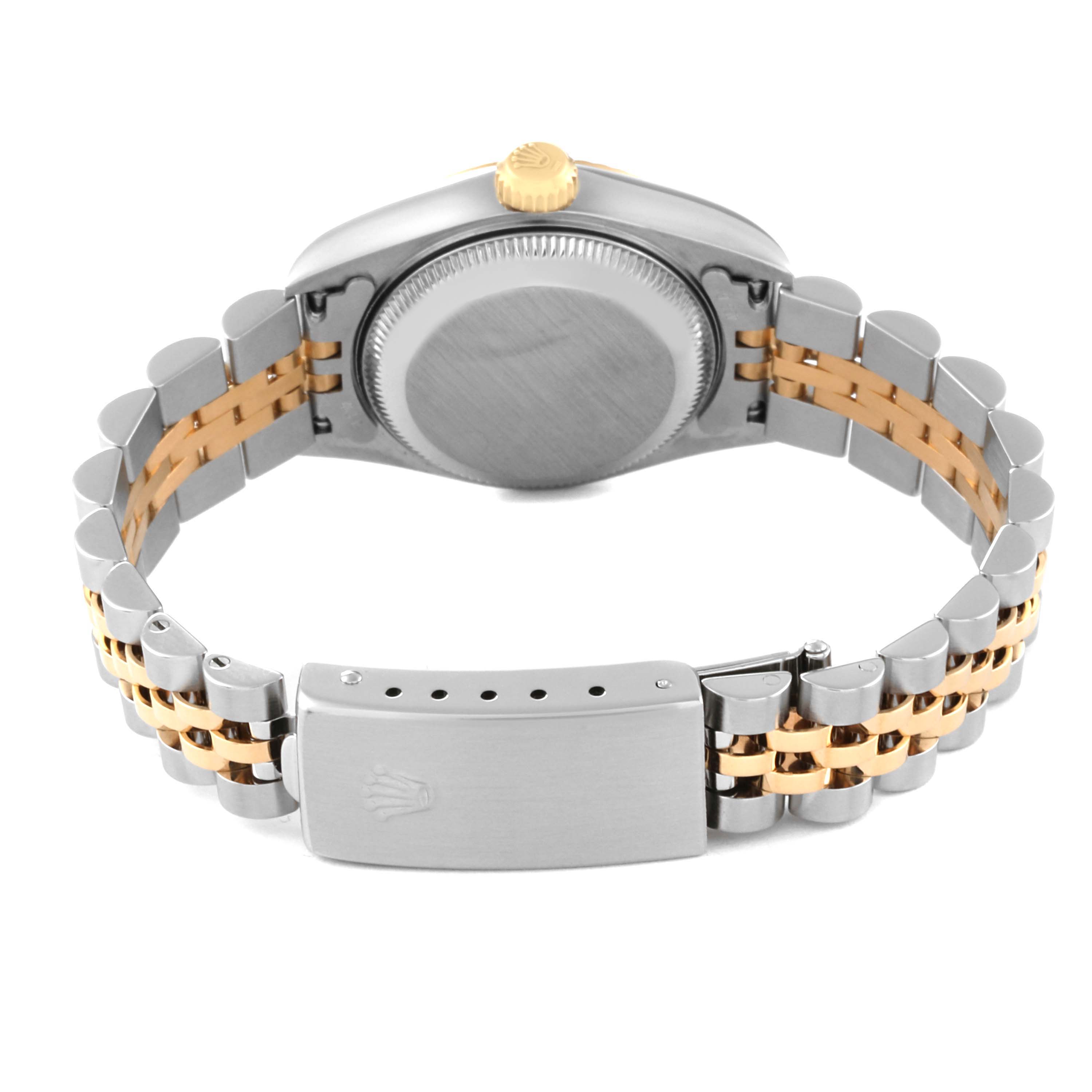 The image shows the back view of a Rolex Datejust 79173 Women's Steel and Gold (two tone) Champagne Dial 79173 Women's Steel and Gold (two tone) Champagne Dial watch, highlighting the two-tone bracelet and the clasp.