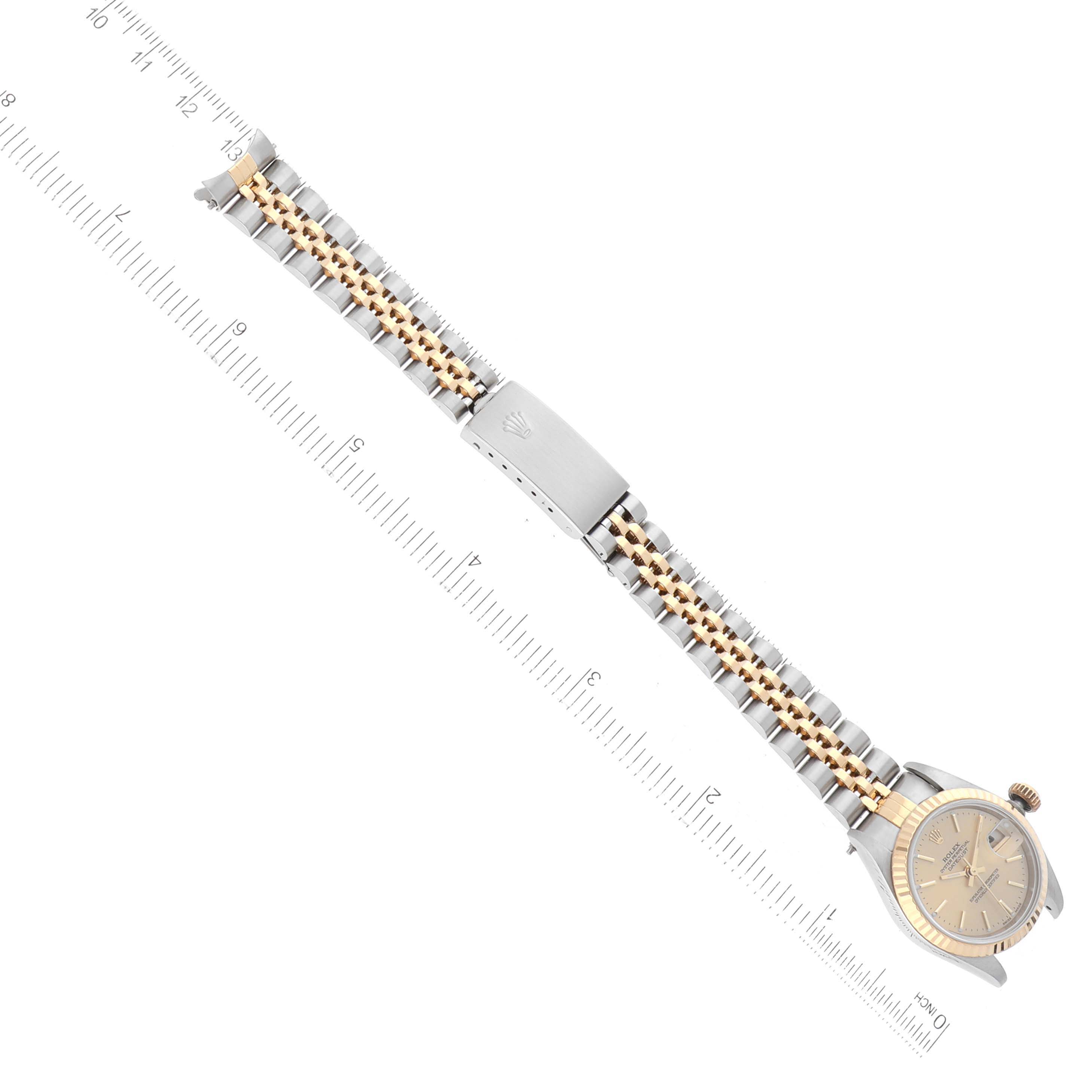 The image shows a Rolex Datejust 79173 Women's Steel and Gold (two tone) Champagne Dial 79173 Women's Steel and Gold (two tone) Champagne Dial watch viewed from the top, displaying the full face, bezel, bracelet, and clasp.