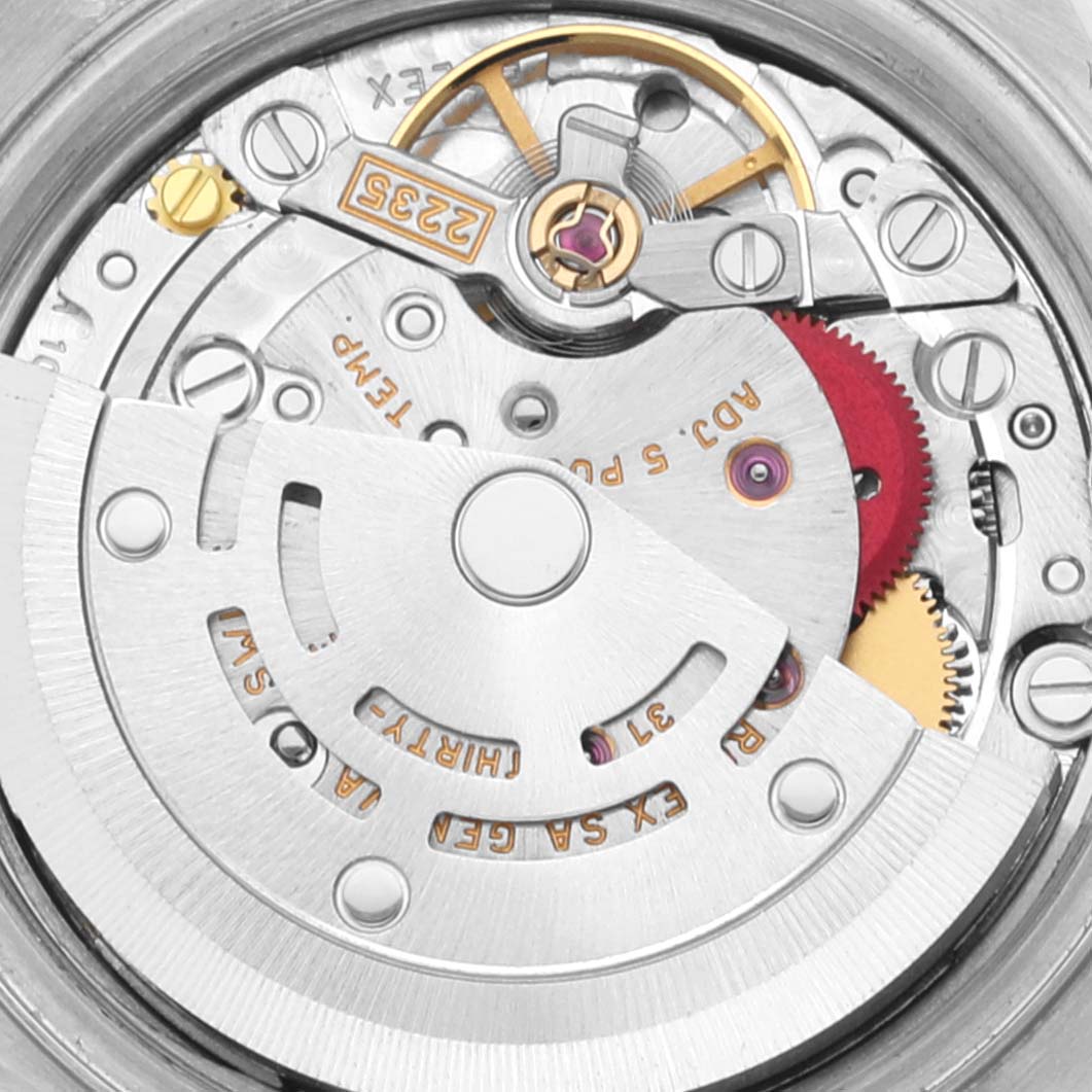 This is a close-up view of the movement mechanism inside a Rolex Datejust 79173 Women's Steel and Gold (two tone) Champagne Dial 79173 Women's Steel and Gold (two tone) Champagne Dial watch.