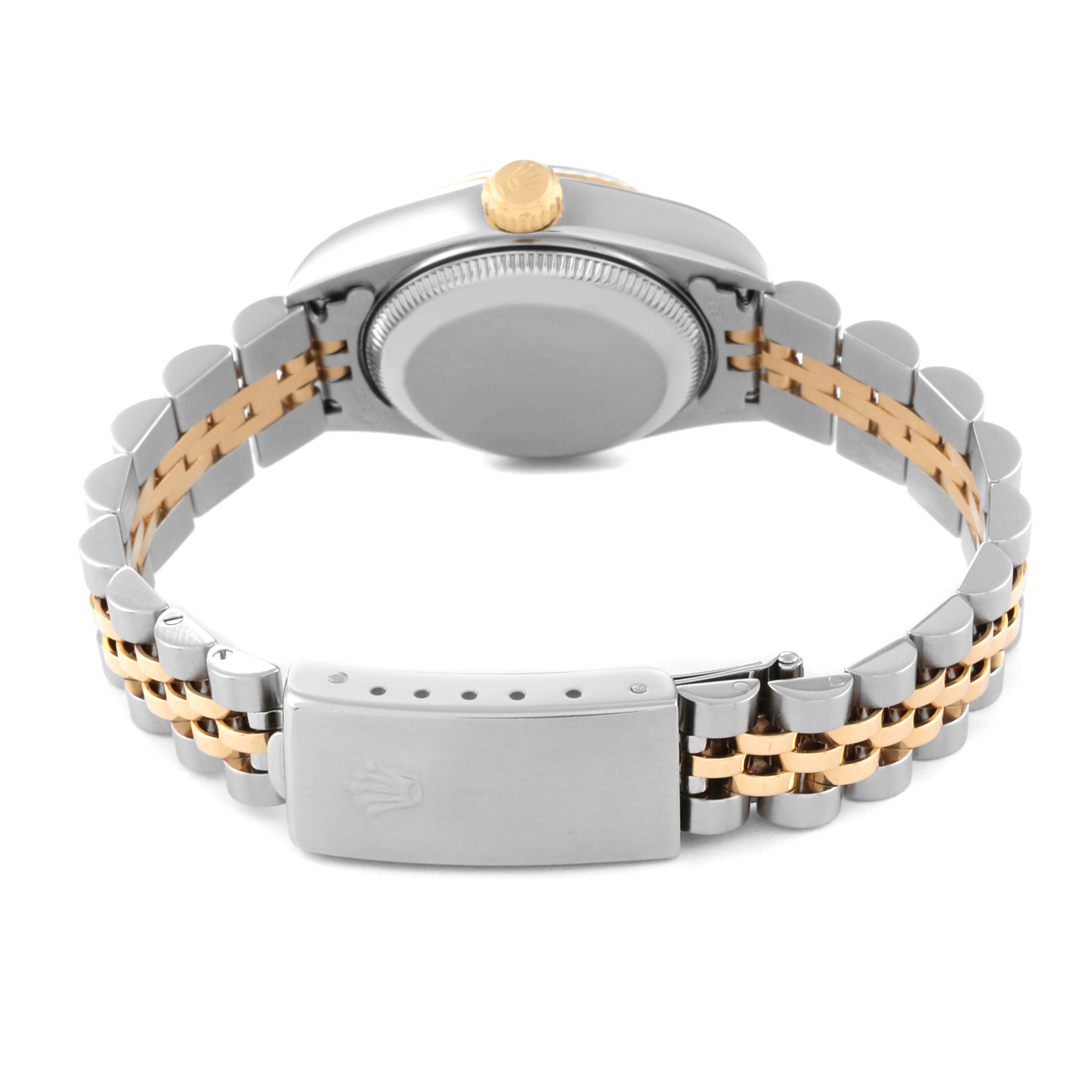 This image shows the back view of a Rolex Datejust 79173 Women's Steel and Gold (two tone) Champagne Dial 79173 Women's Steel and Gold (two tone) Champagne Dial watch, highlighting the case, crown, and two-tone Jubilee bracelet.