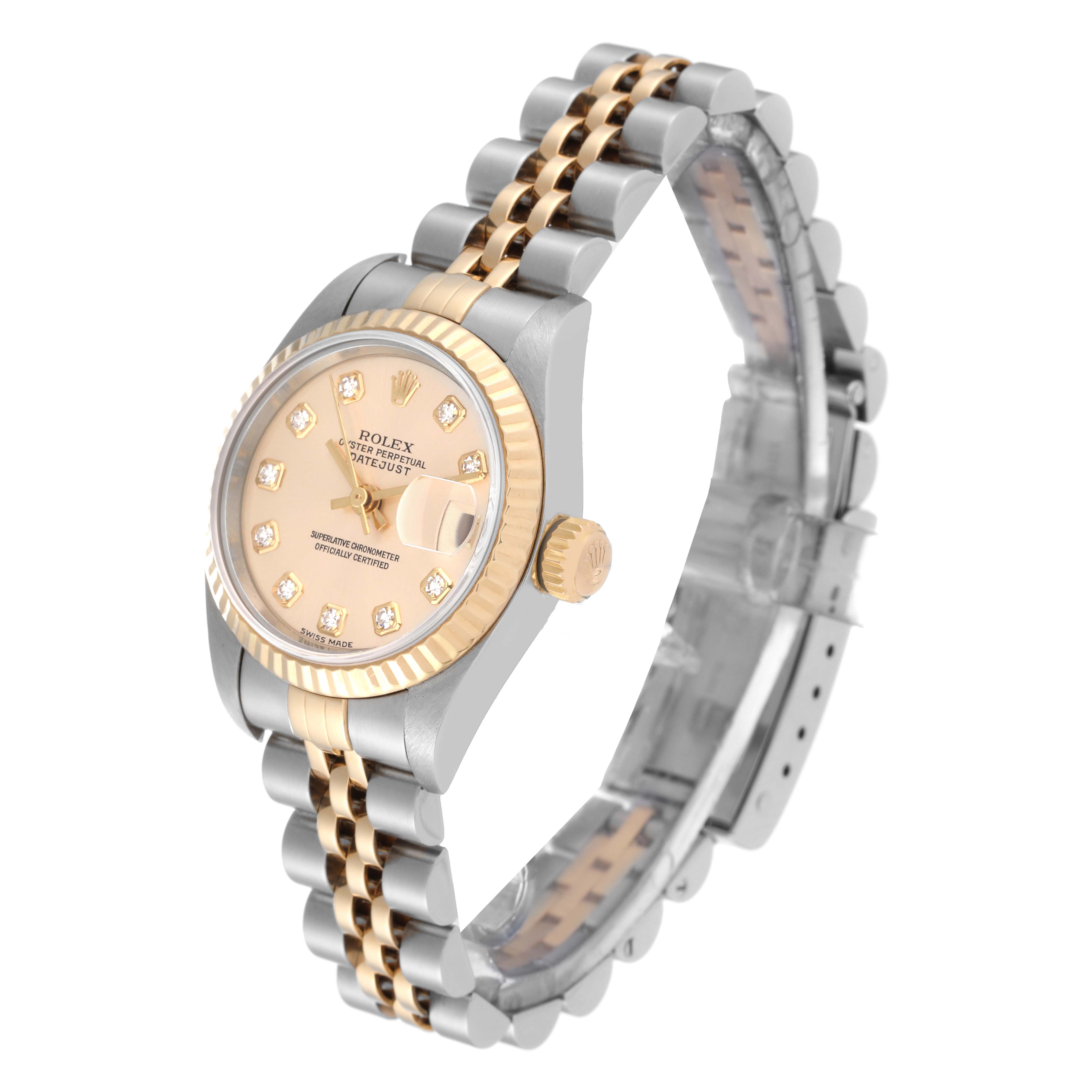 The image shows a side angle of a Rolex Datejust 79173 Women's Steel and Gold (two tone) Champagne Dial 79173 Women's Steel and Gold (two tone) Champagne Dial watch, featuring the bezel, dial, crown, and two-tone bracelet.
