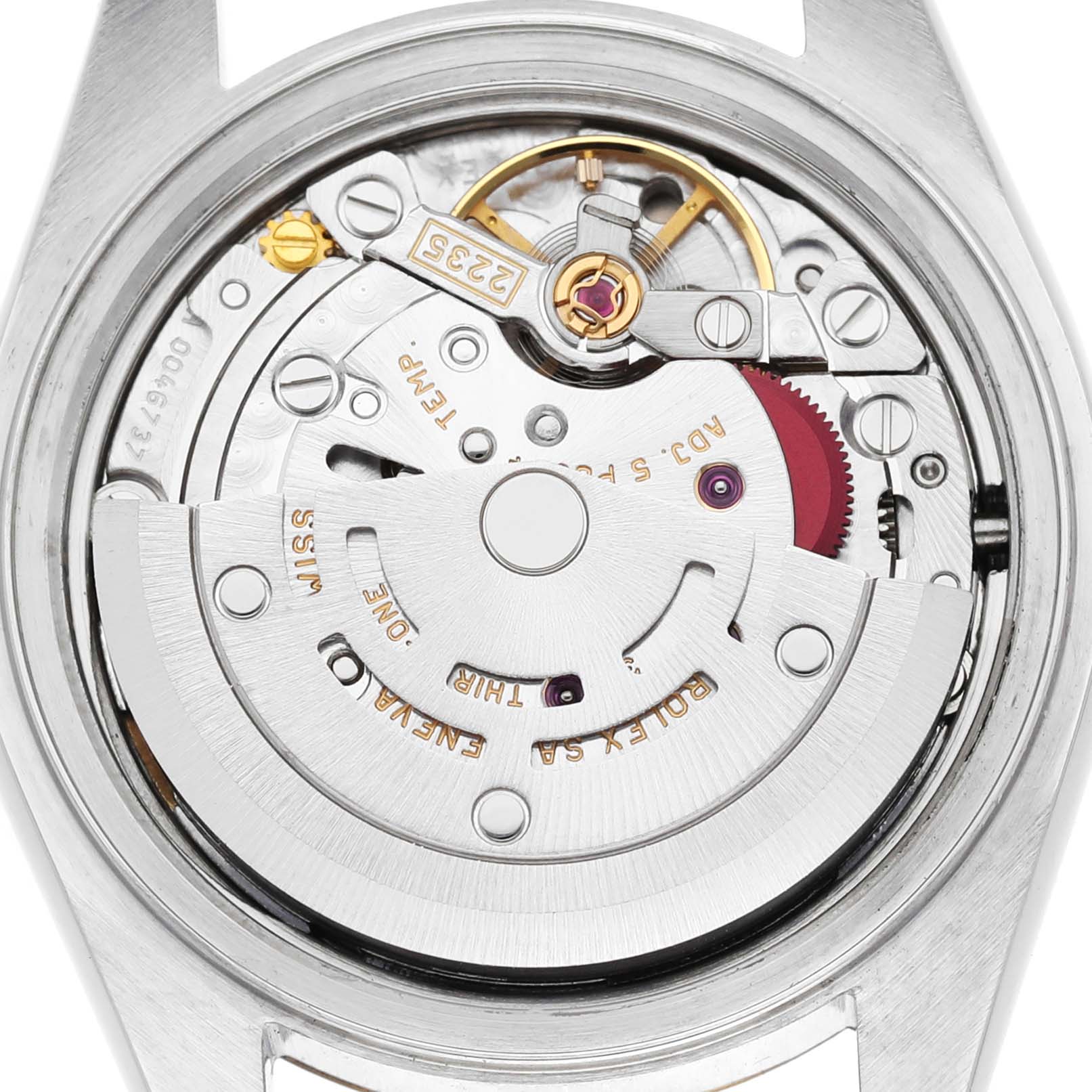 This image shows the intricate movement mechanism of a Rolex Datejust 79173 Women's Steel and Gold (two tone) Champagne Dial from the back.