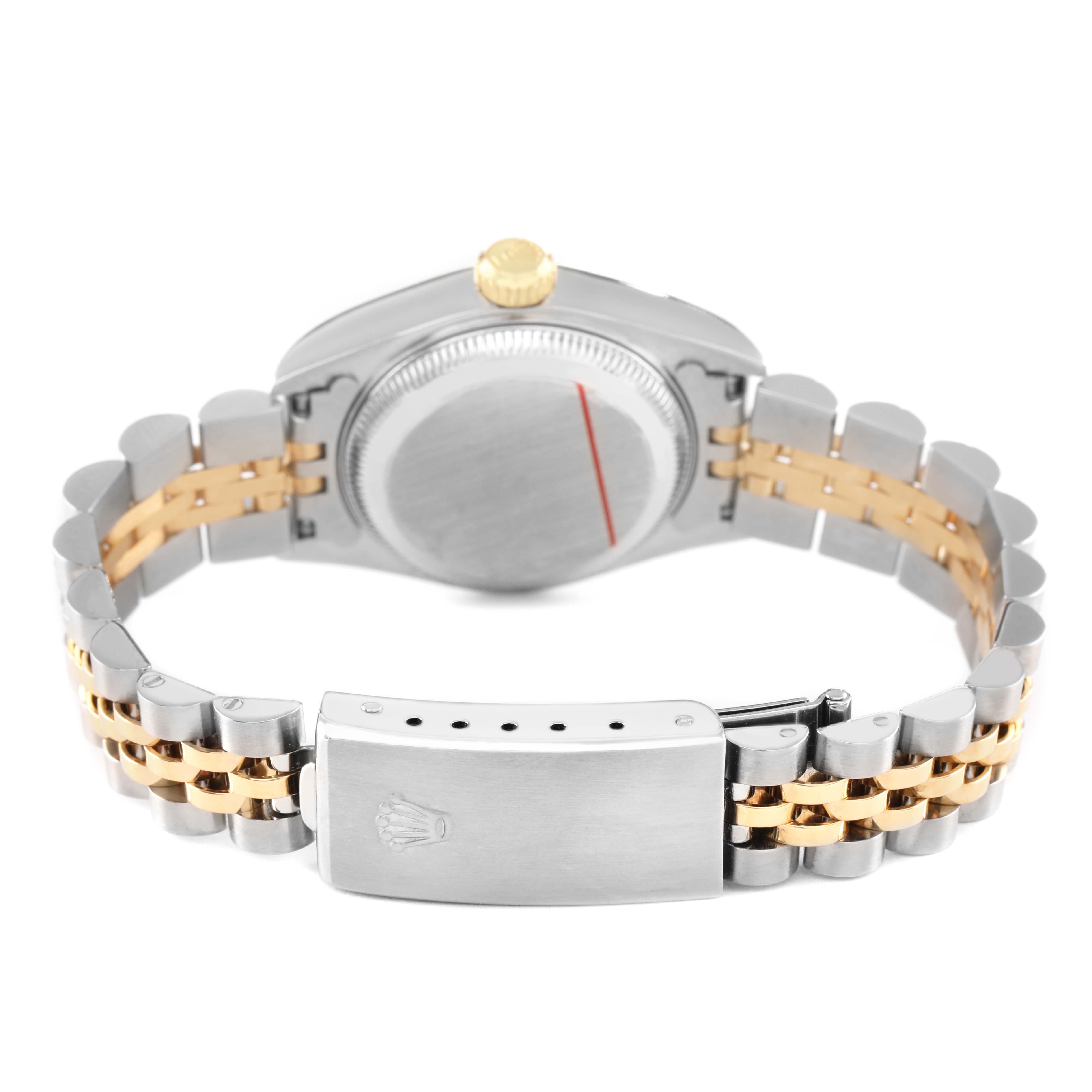 The image shows the back view of a Rolex Datejust 79173 Women's Steel and Gold (two tone) Champagne Dial, highlighting the case back and gold and silver bracelet with the clasp.